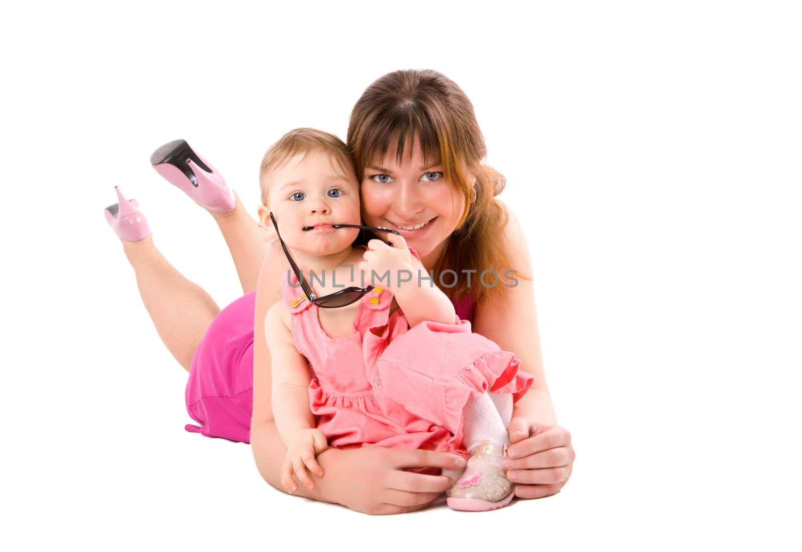 Mother with baby both wearing pink isolated on white