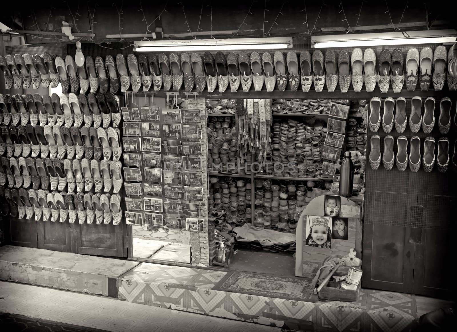 Arabian shoes on sale in a traditional souk in old Dubai, UAE.