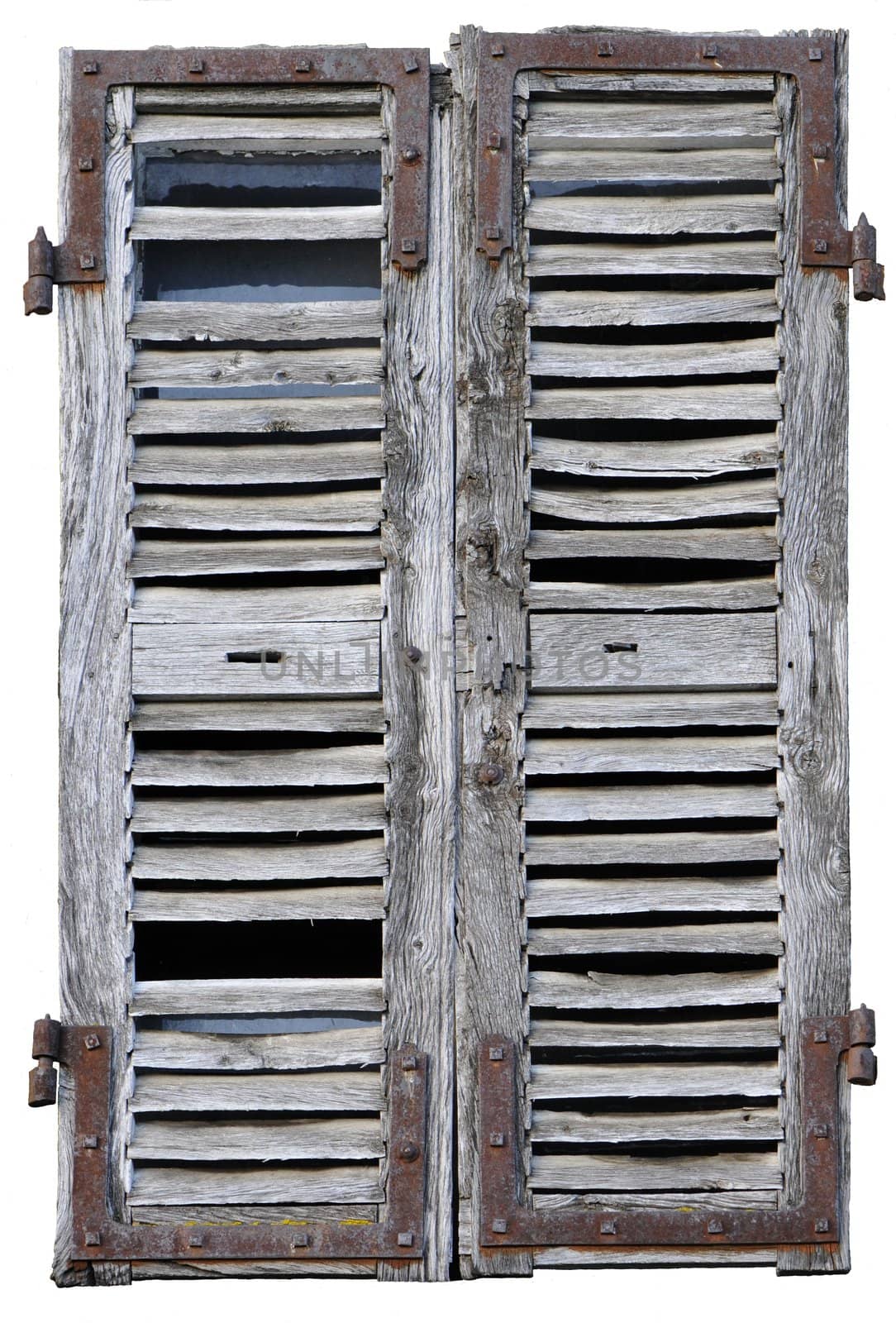 Closed window with old wood shutters on a white background