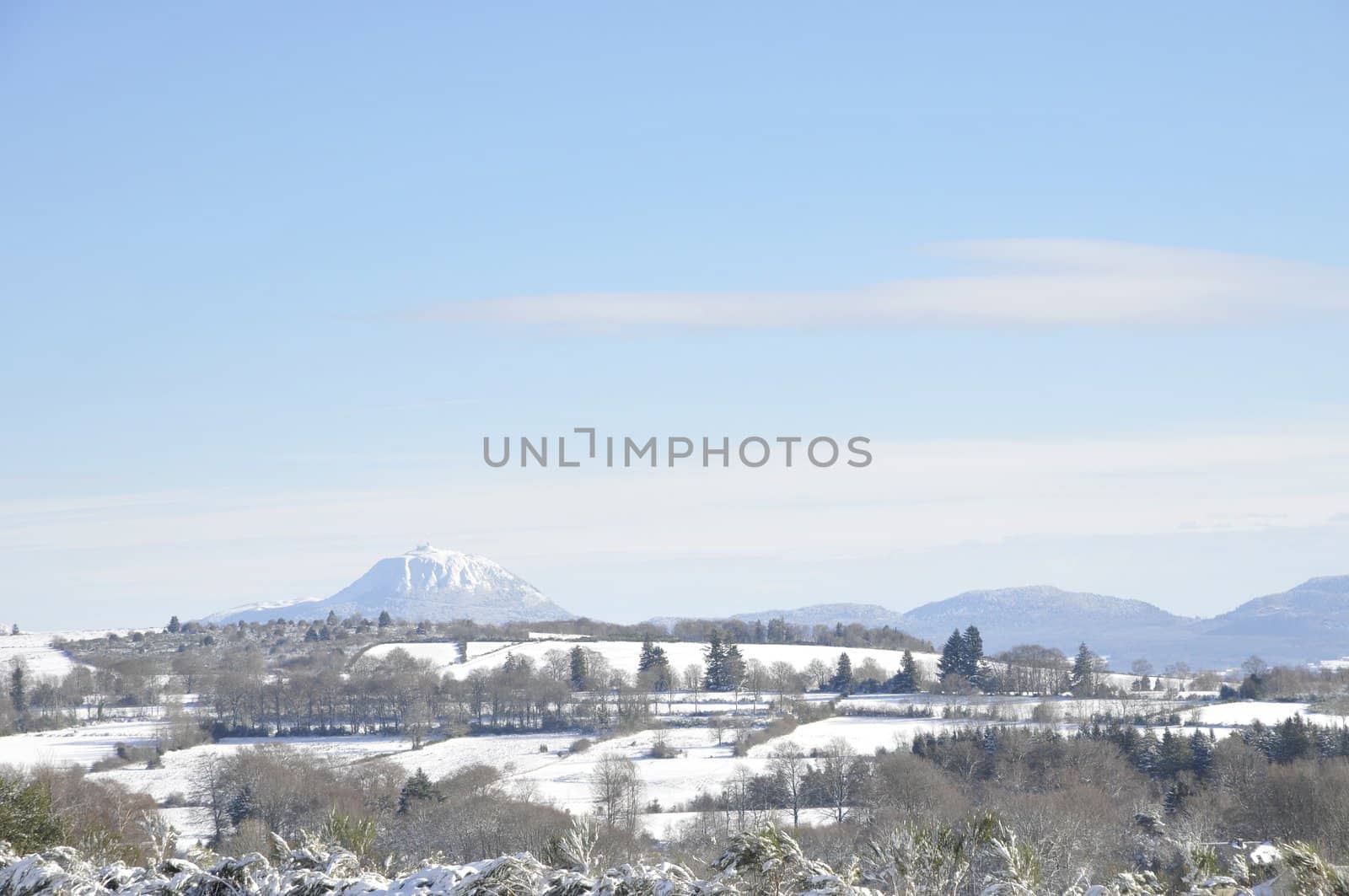 Winter landscape with "Puy-de-dome" mountain in "Auvergne" region in France