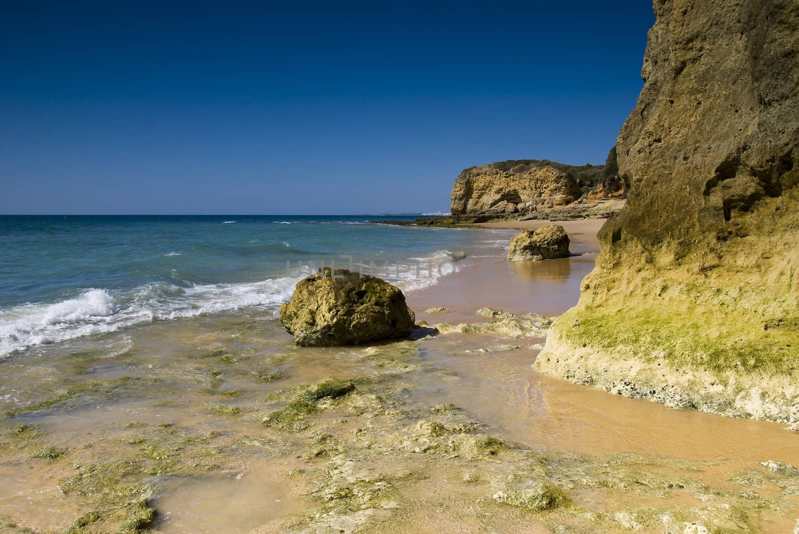 Oura beach and cliffs in Albufeira Portugal