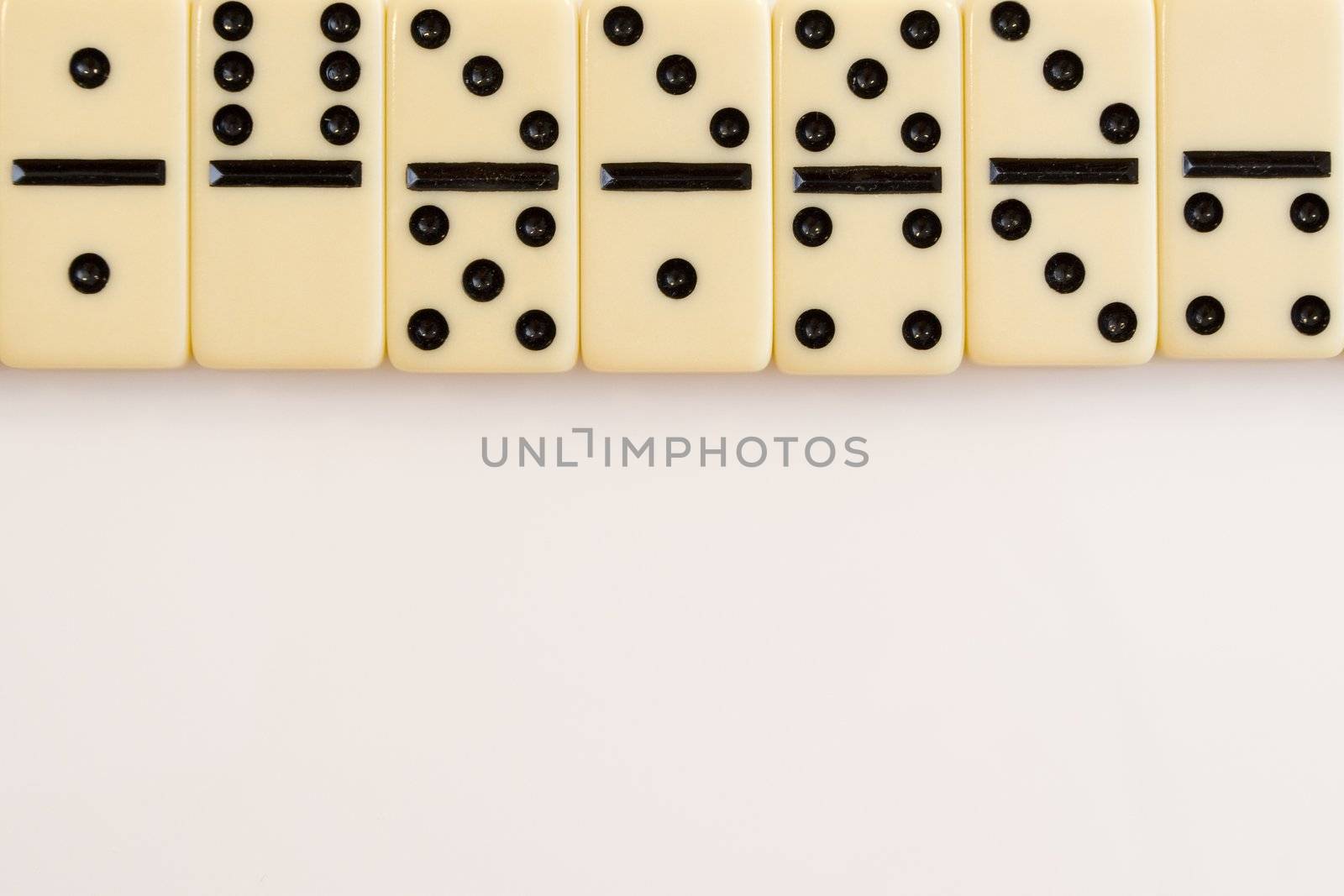 Domino bricks on white background