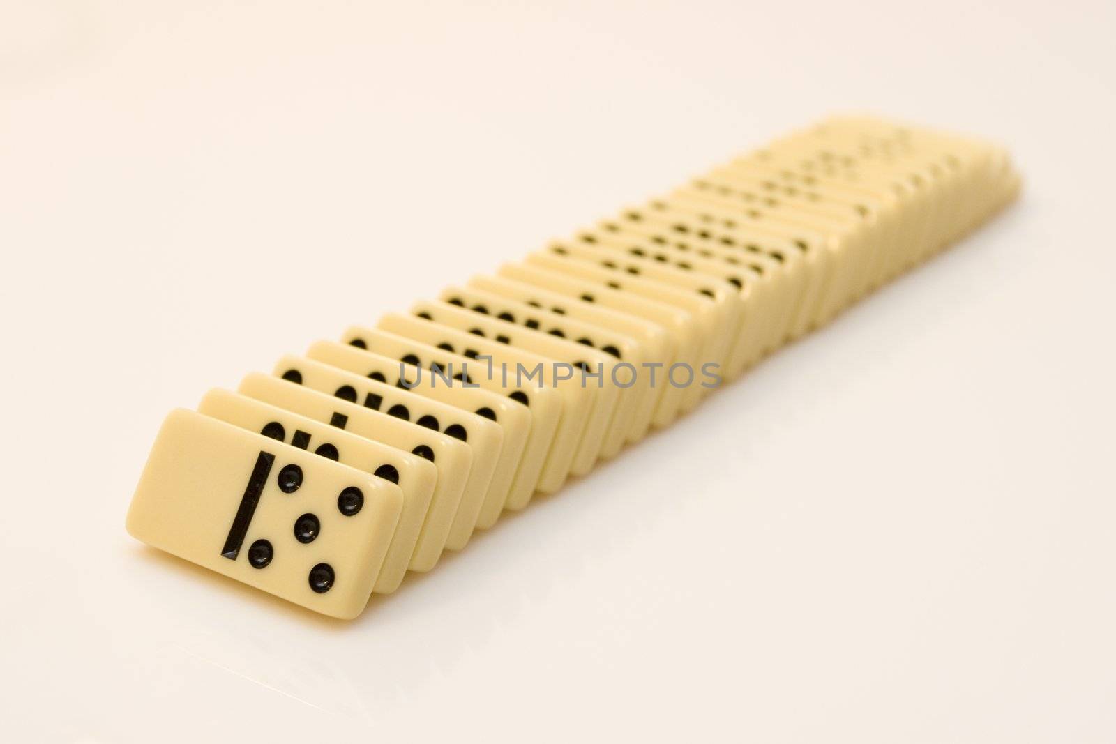 Domino bricks on white background