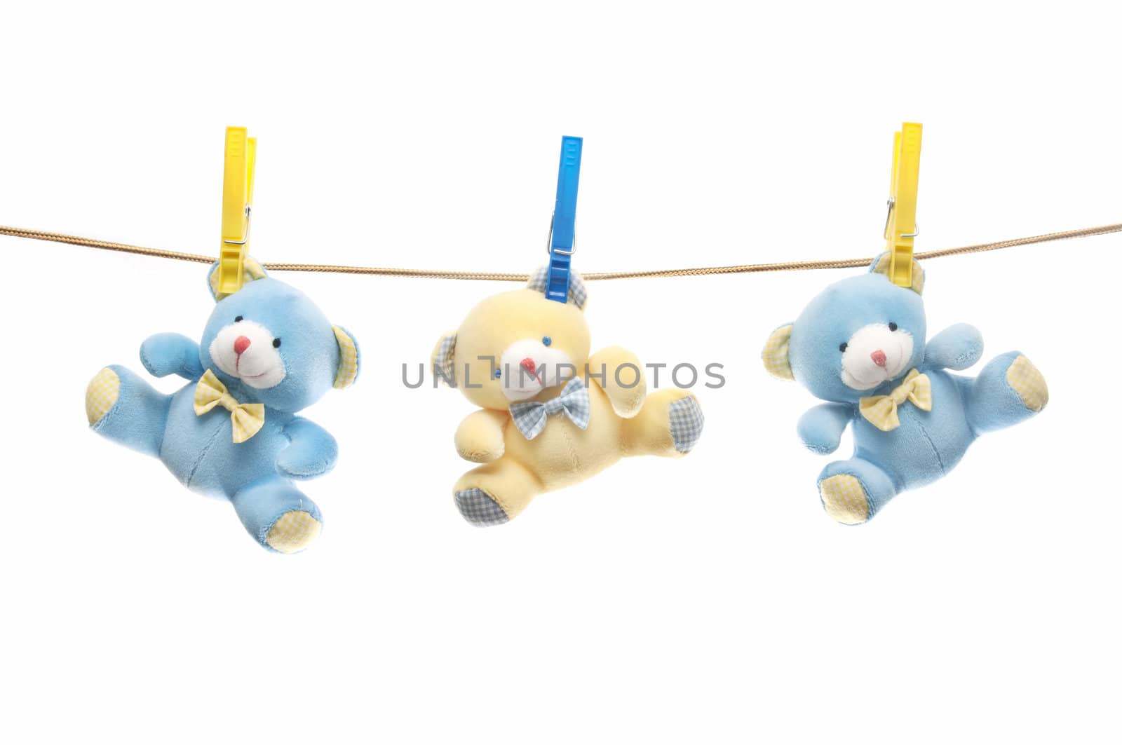 child clothesline teddy bear isolated on white background
 