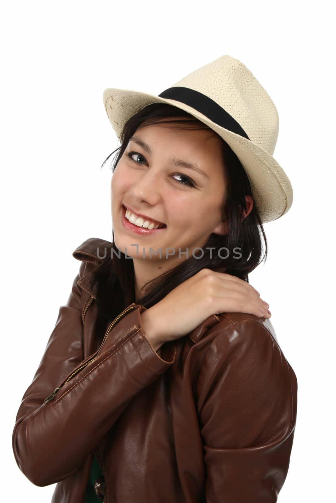 Pretty young lady with nice smile and wearing a leather jacket