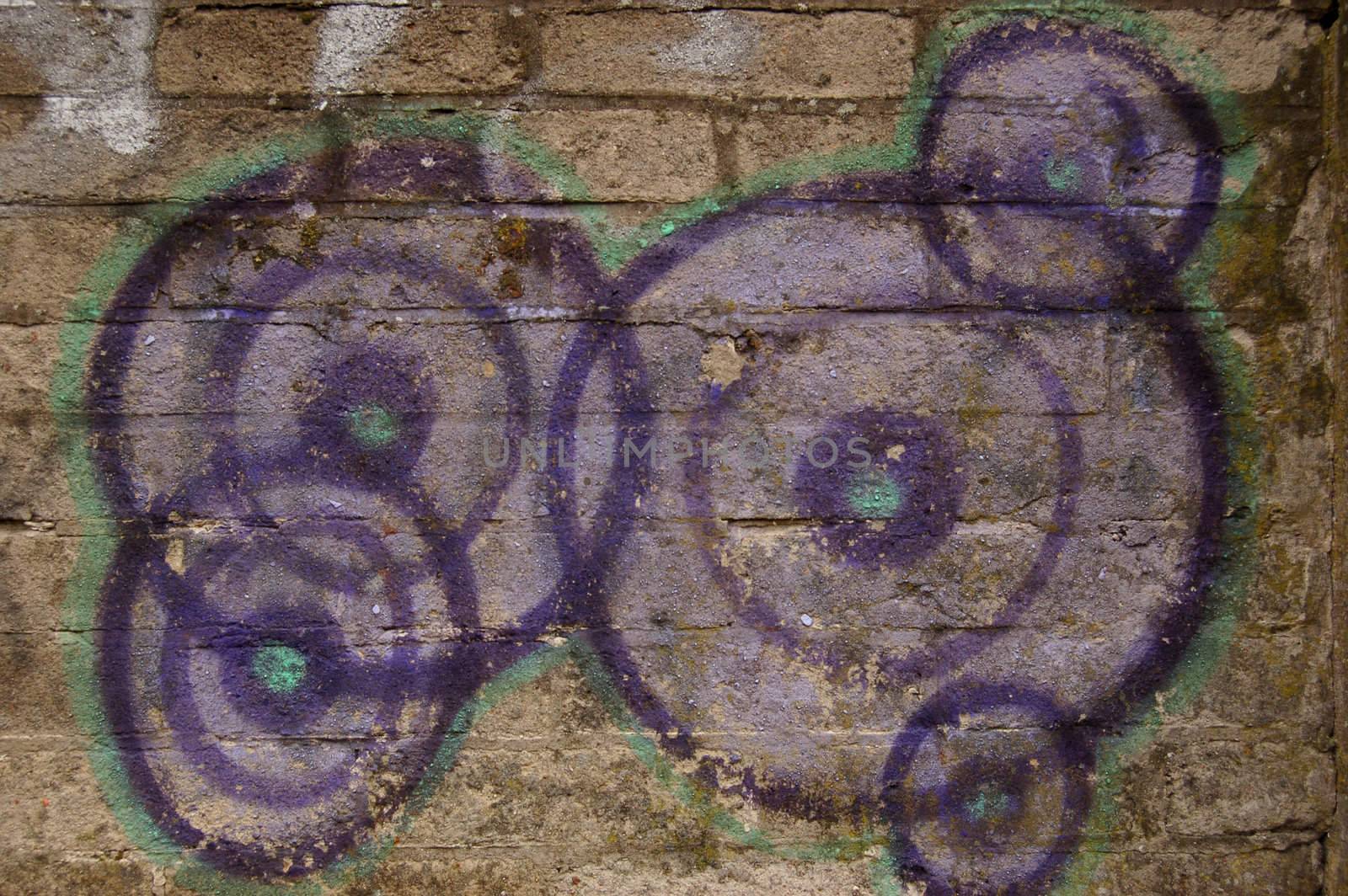 graffiti on brick wall by johnnychaos