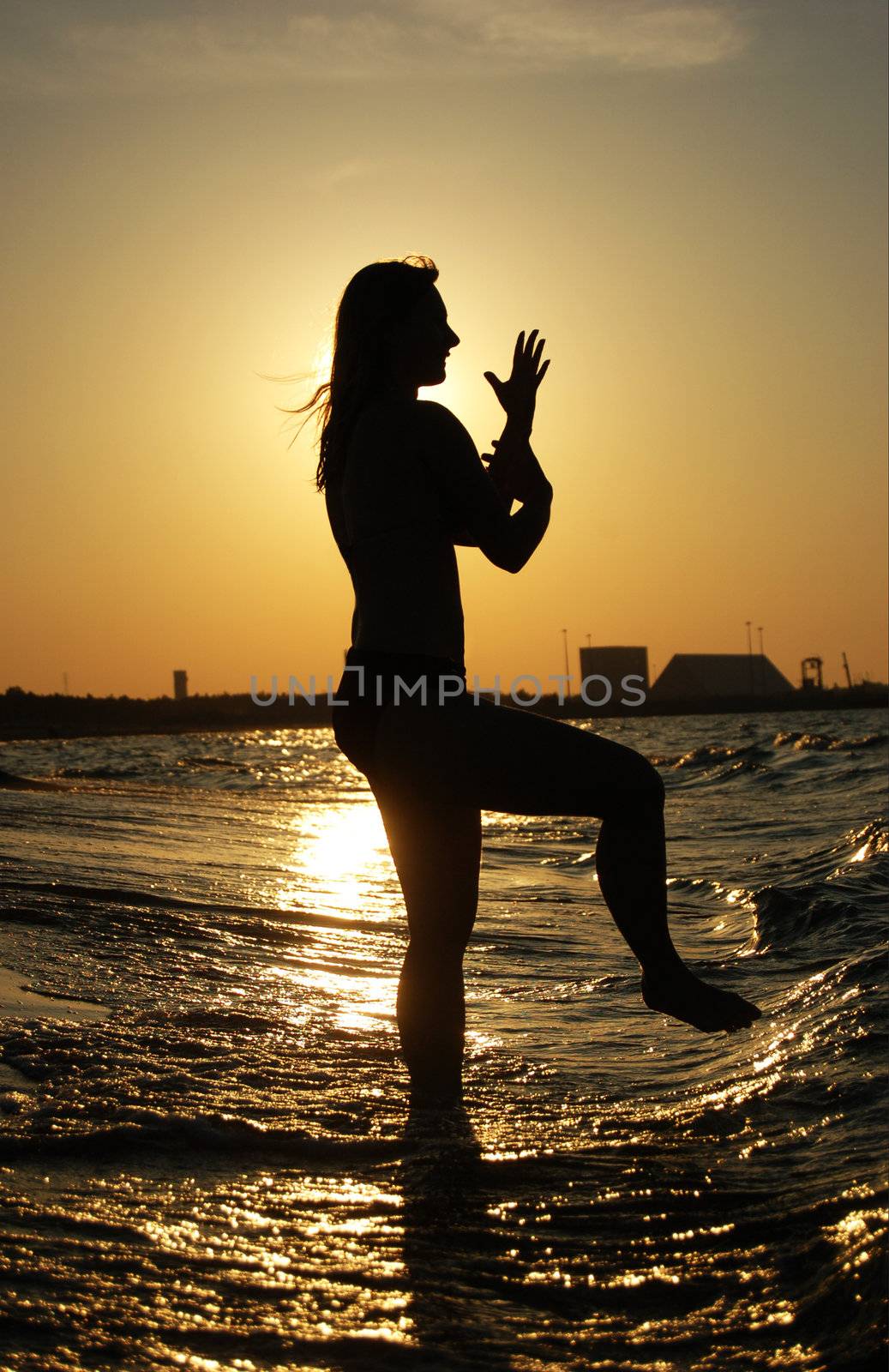 Sunset Tai Chi on a beach by johnnychaos