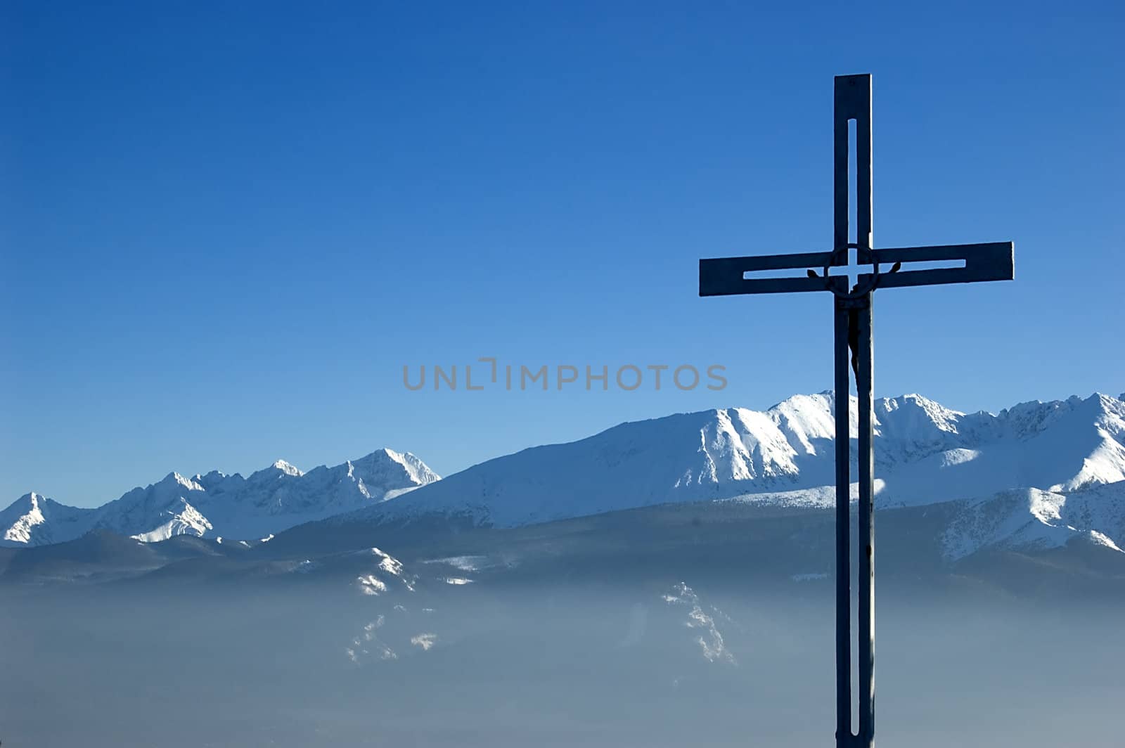 Cross in mountain scenery. Gubalowka in Tatra Mountains, Zakopane, Poland