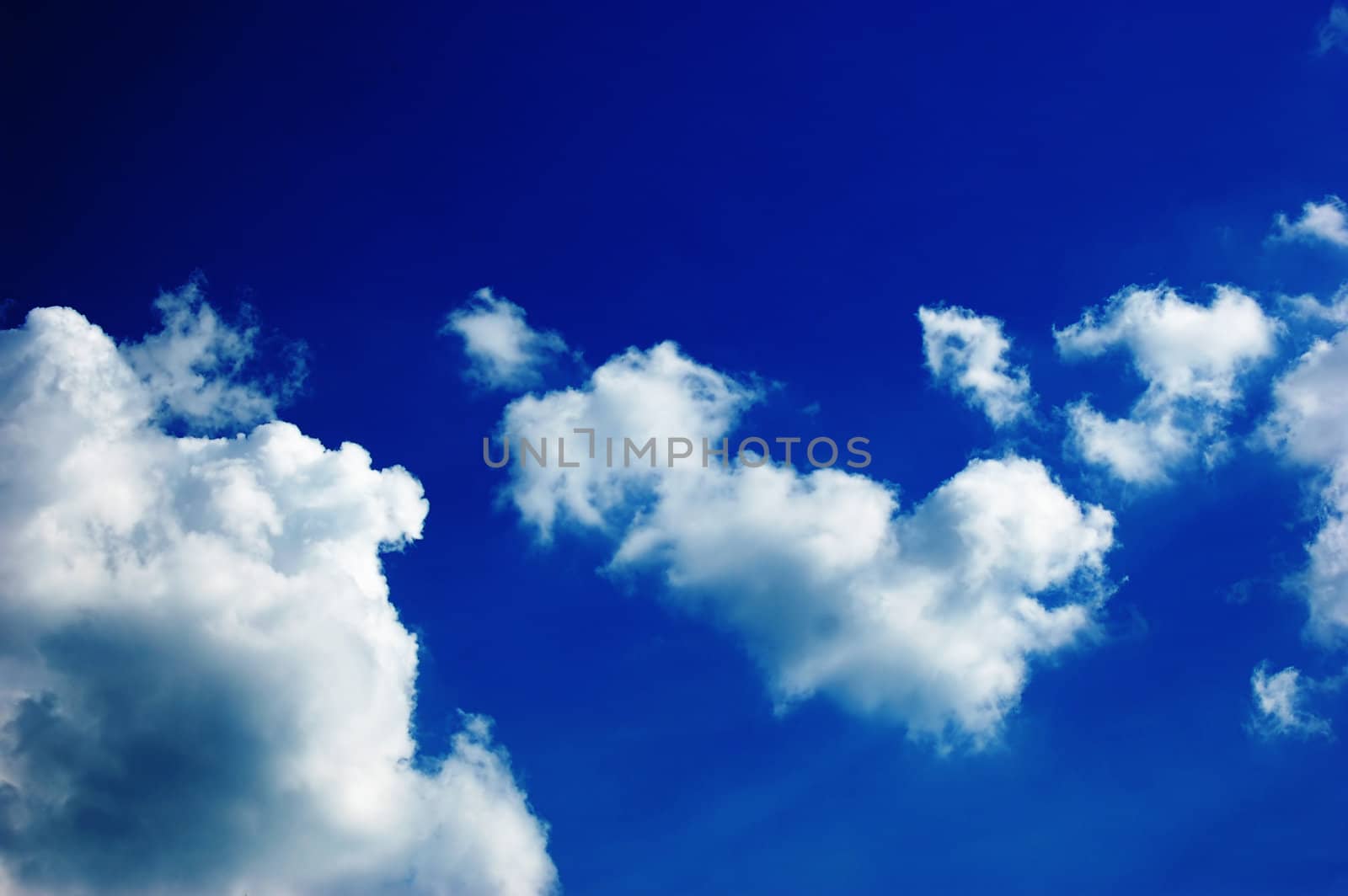 Blue sky and white clouds by johnnychaos