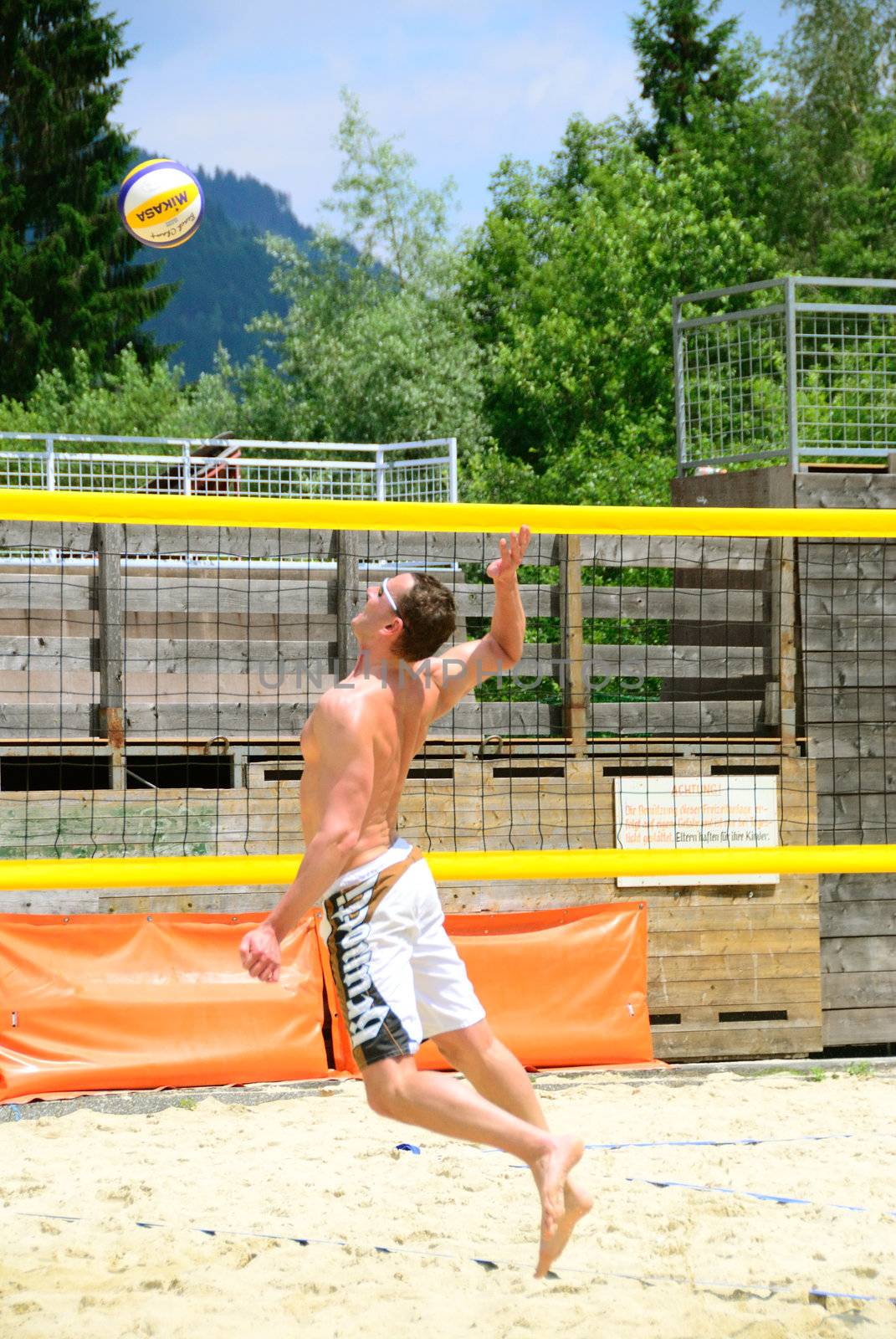 ZELL AM SEE, AUSTRIA - JUNE 26: Participant at the Beach City 2010, the biggest amateur Beach Volleyball Tournament in Austria. June 26, 2010 in Zell am See, Austria