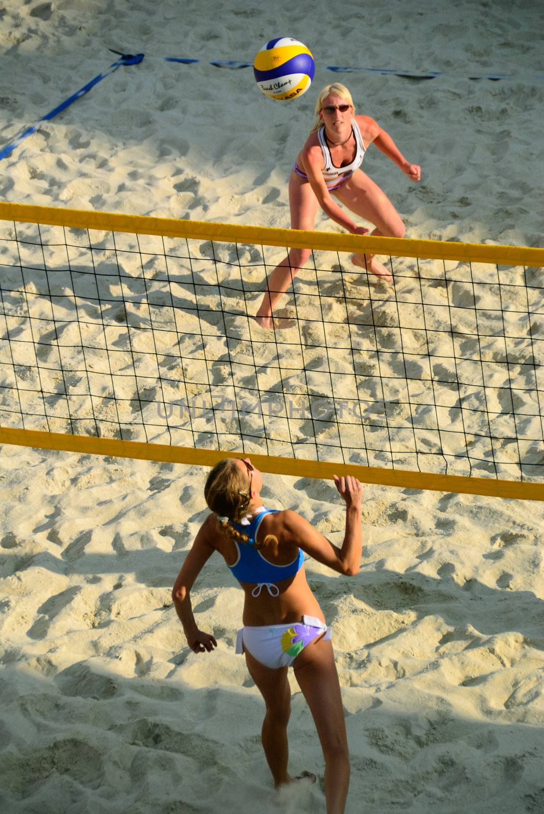 ZELL AM SEE, AUSTRIA - JUNE 26: Participants at the Beach City 2010 center court, the biggest amateur Beach Volleyball Tournament in Austria. June 26, 2010 in Zell am See, Austria