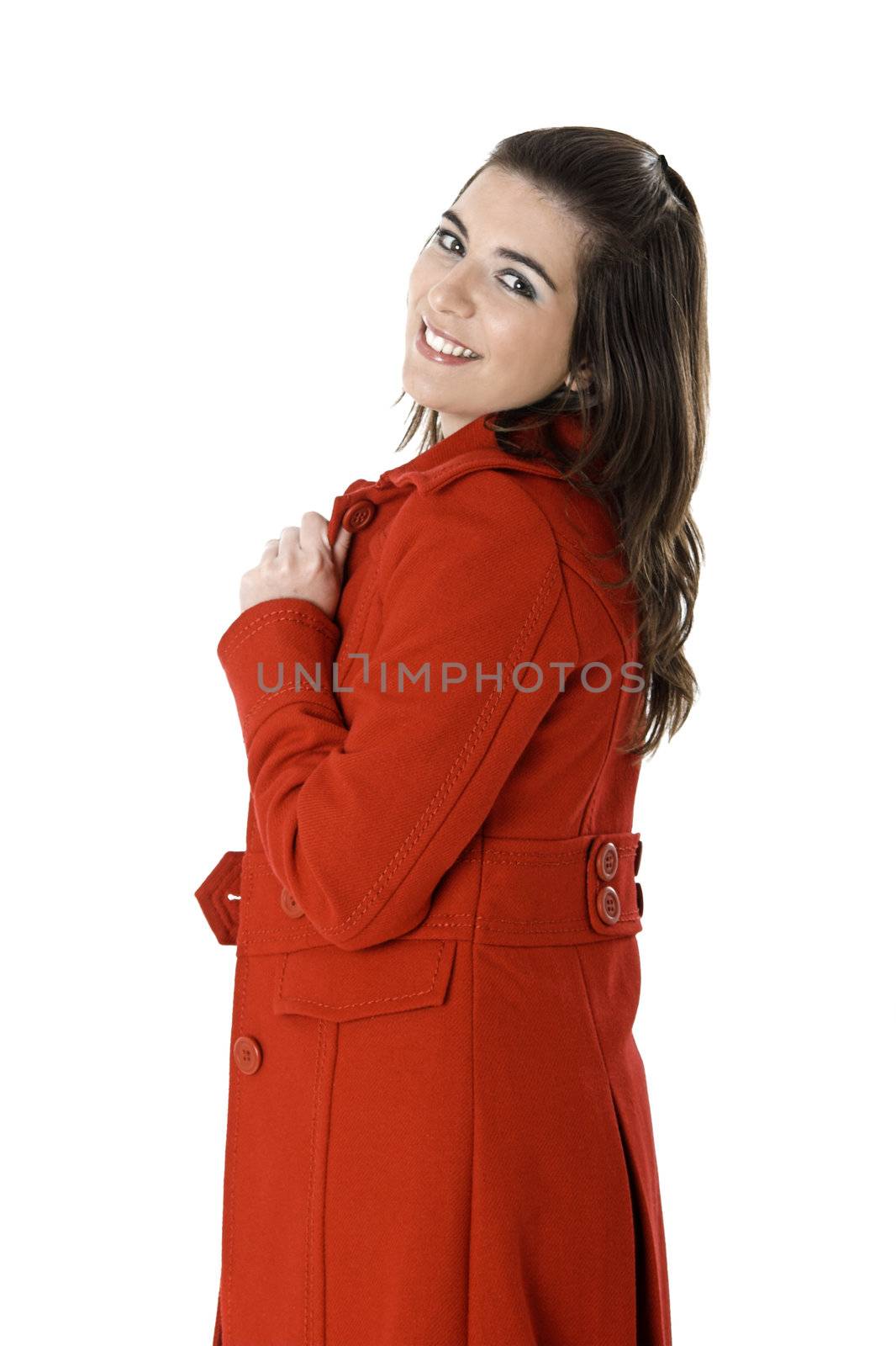 Beautiful fashion woman posing with a red coat isolated on white
