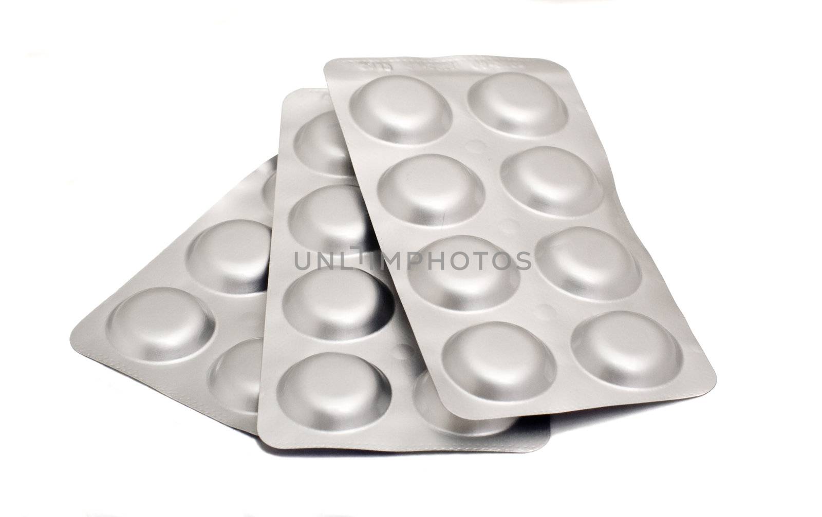 pills in blister pack, isolated on white by aazz