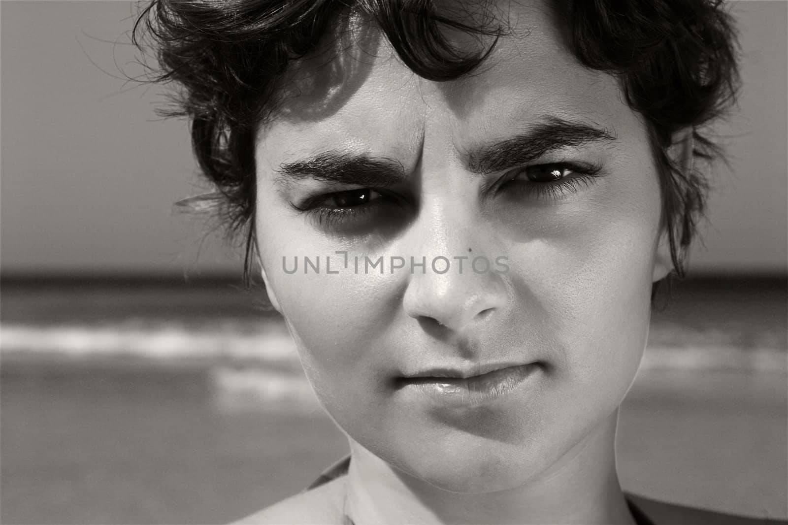 Outdoor portrait of a woman on the beach (toned in PS)