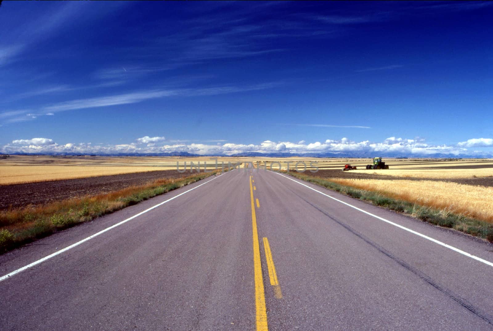 Empty road in Montana in time of harvest