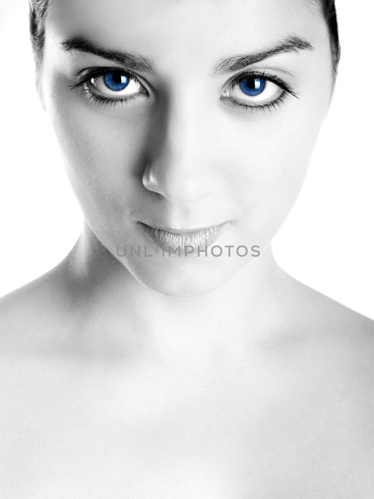 Portrait of a young and beautiful woman with blue eyes