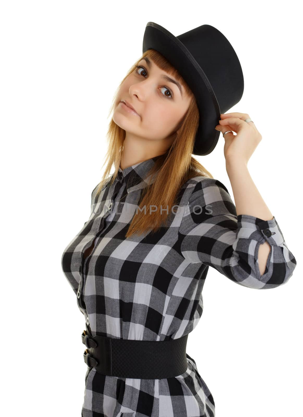 A beautiful young woman in a black hat posing on a white background