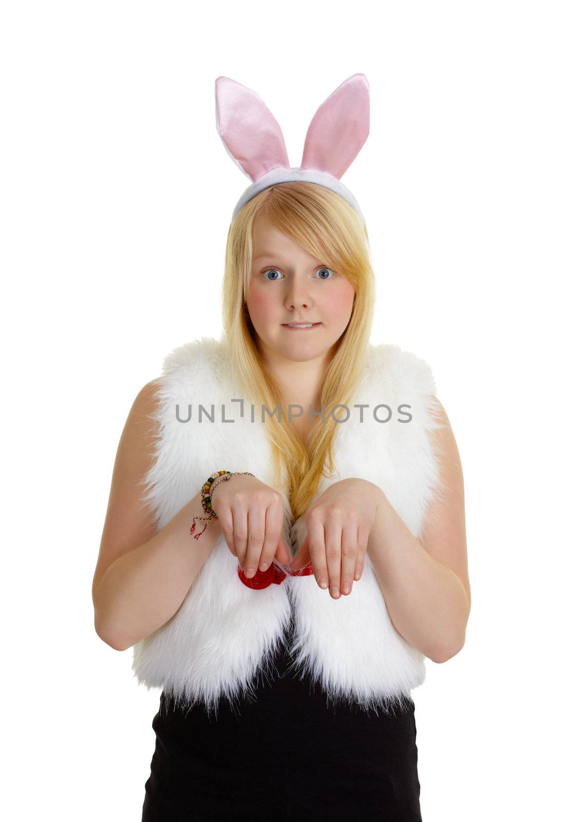 Funny young girl with a pink rabbit ears isolated on white