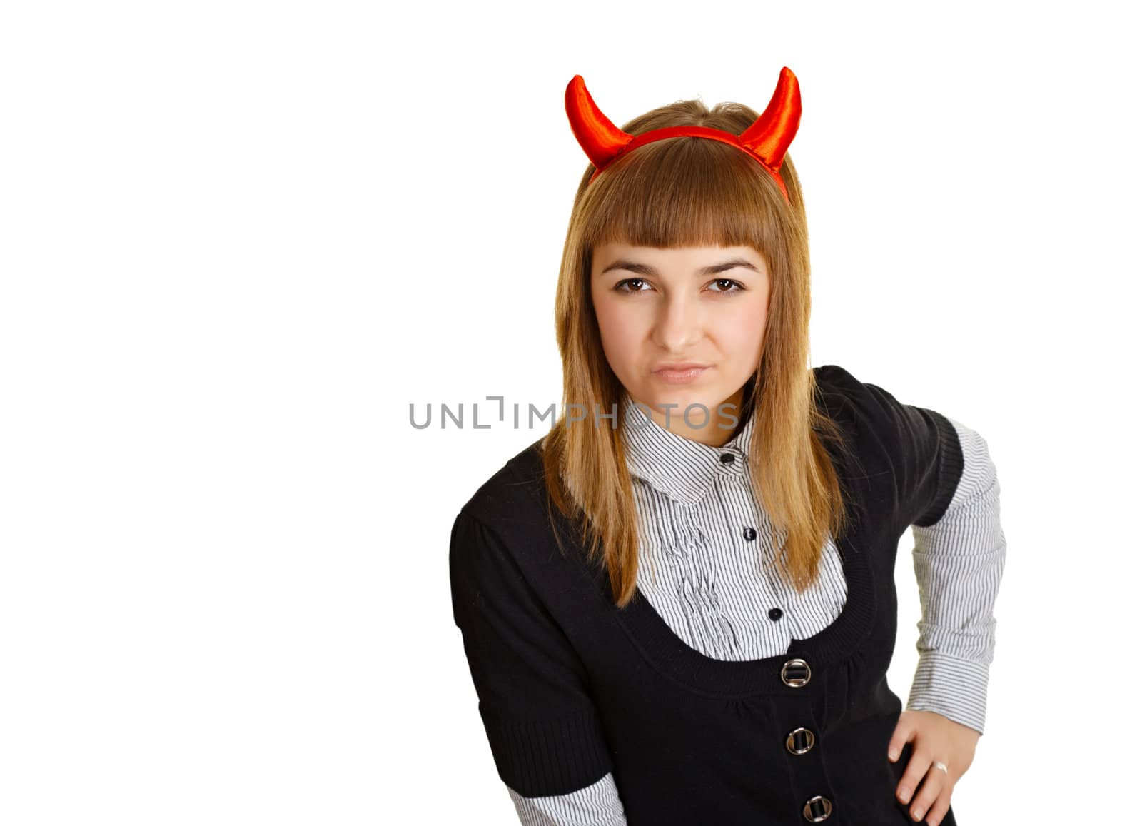Young woman with devil horns, sly looks - isolated on white