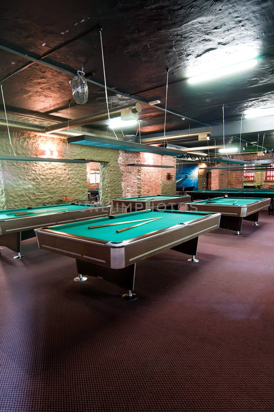 Shot of billiard room with tables, interior