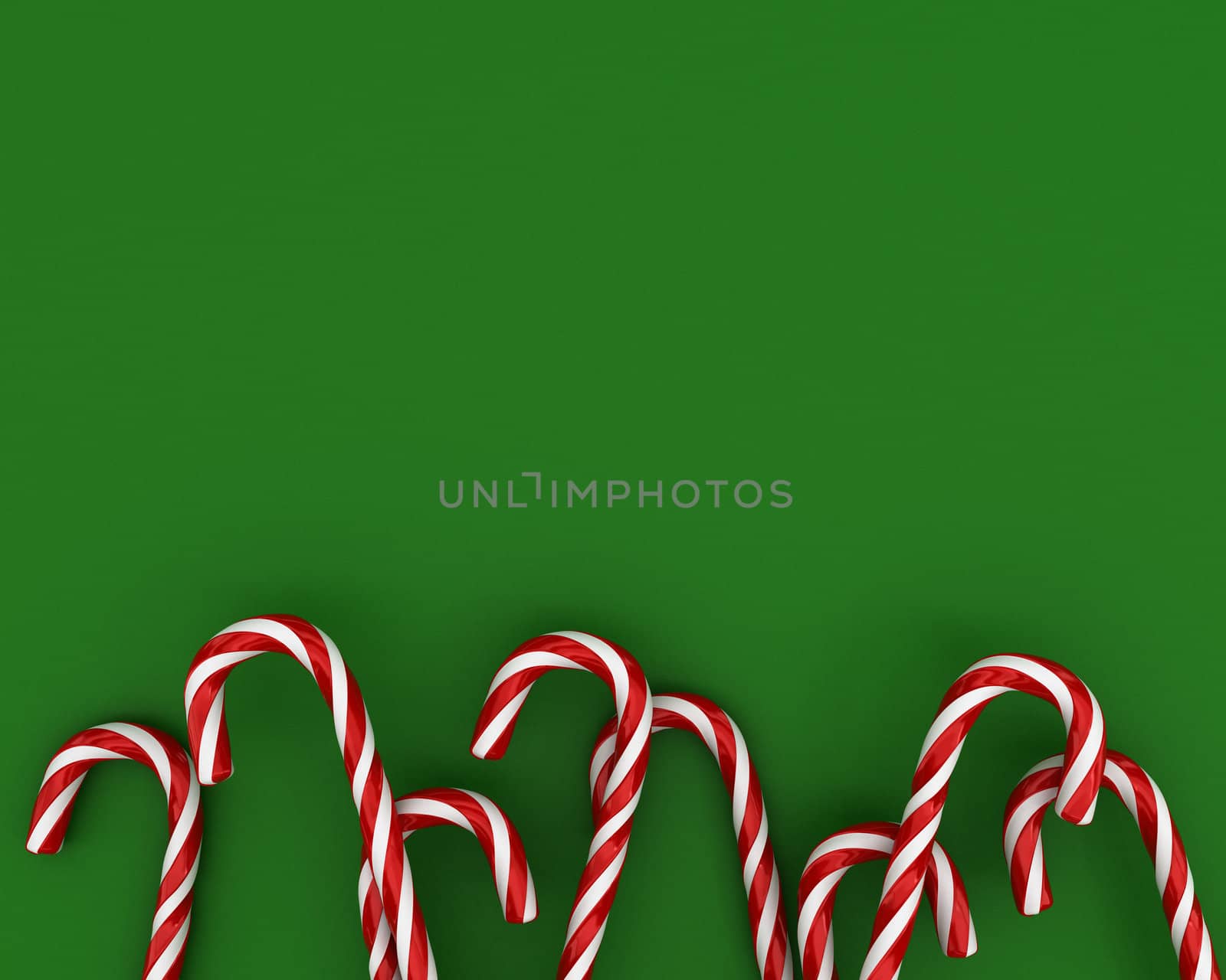 A lot of christmas candies on green background