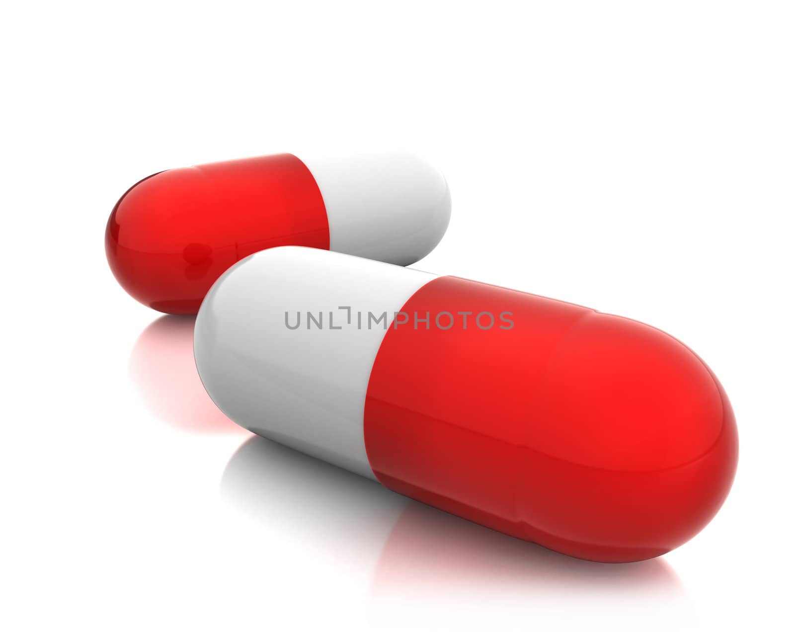 Two red pills isolated on white background