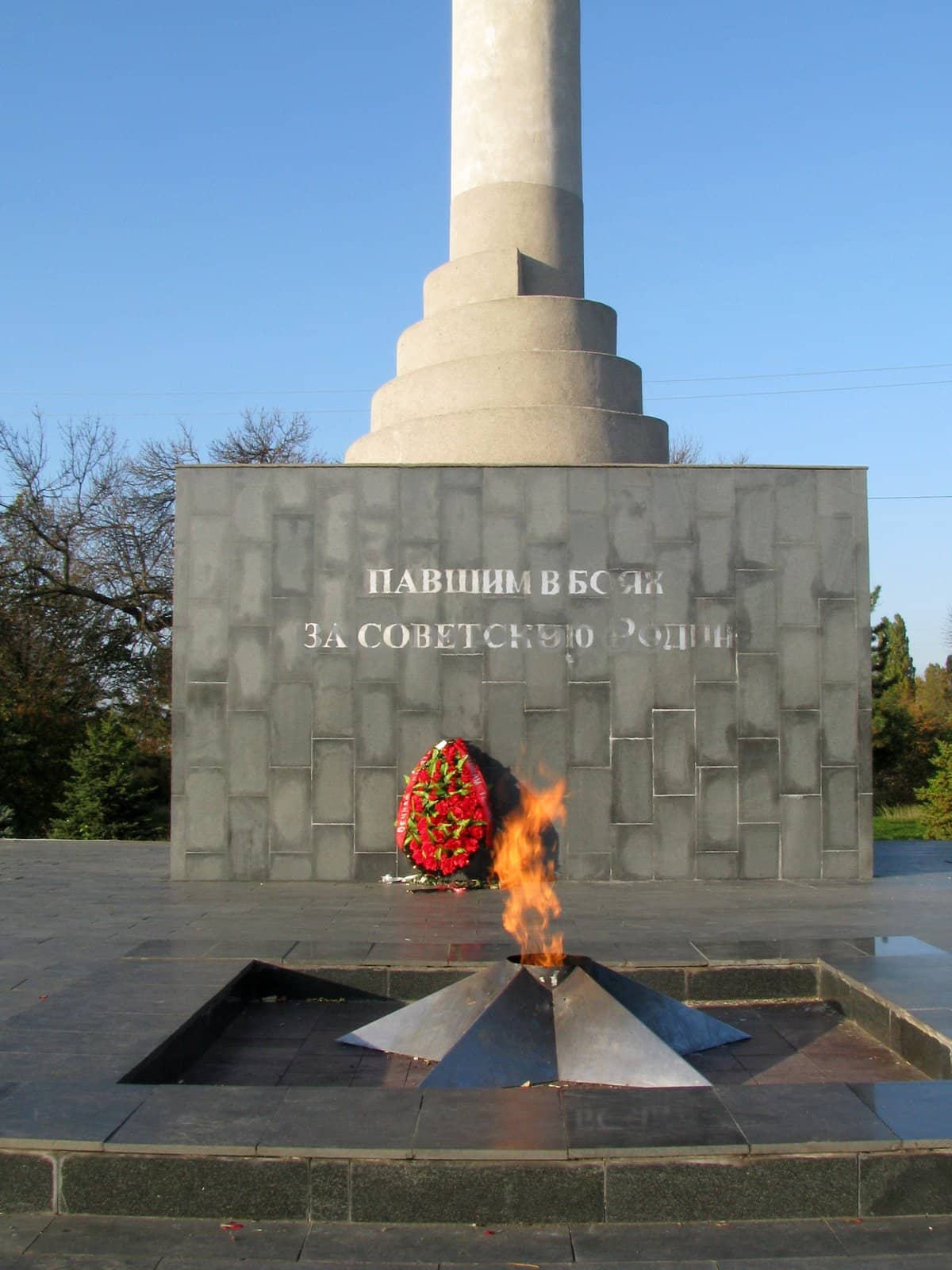 Monument; eternal flame; laid; architectral building; styles; park