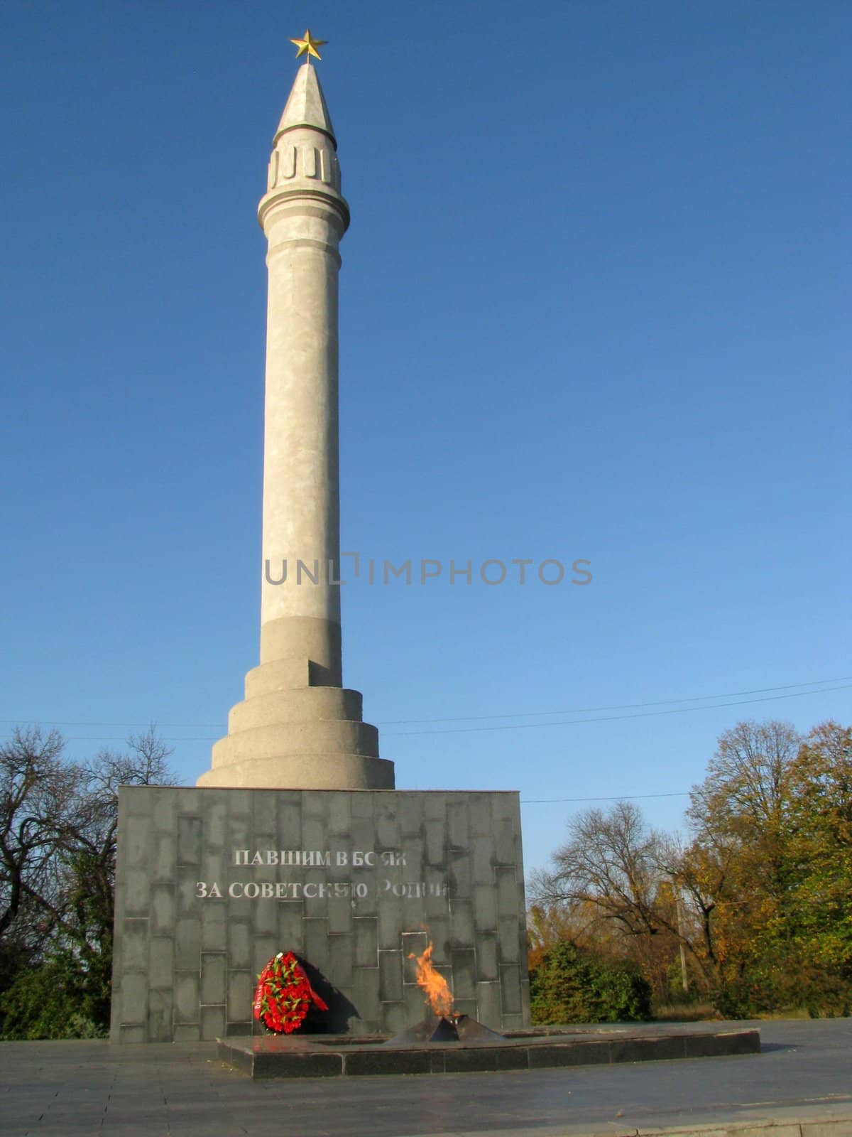 Monument; eternal flame; laid; architectral building; styles; park