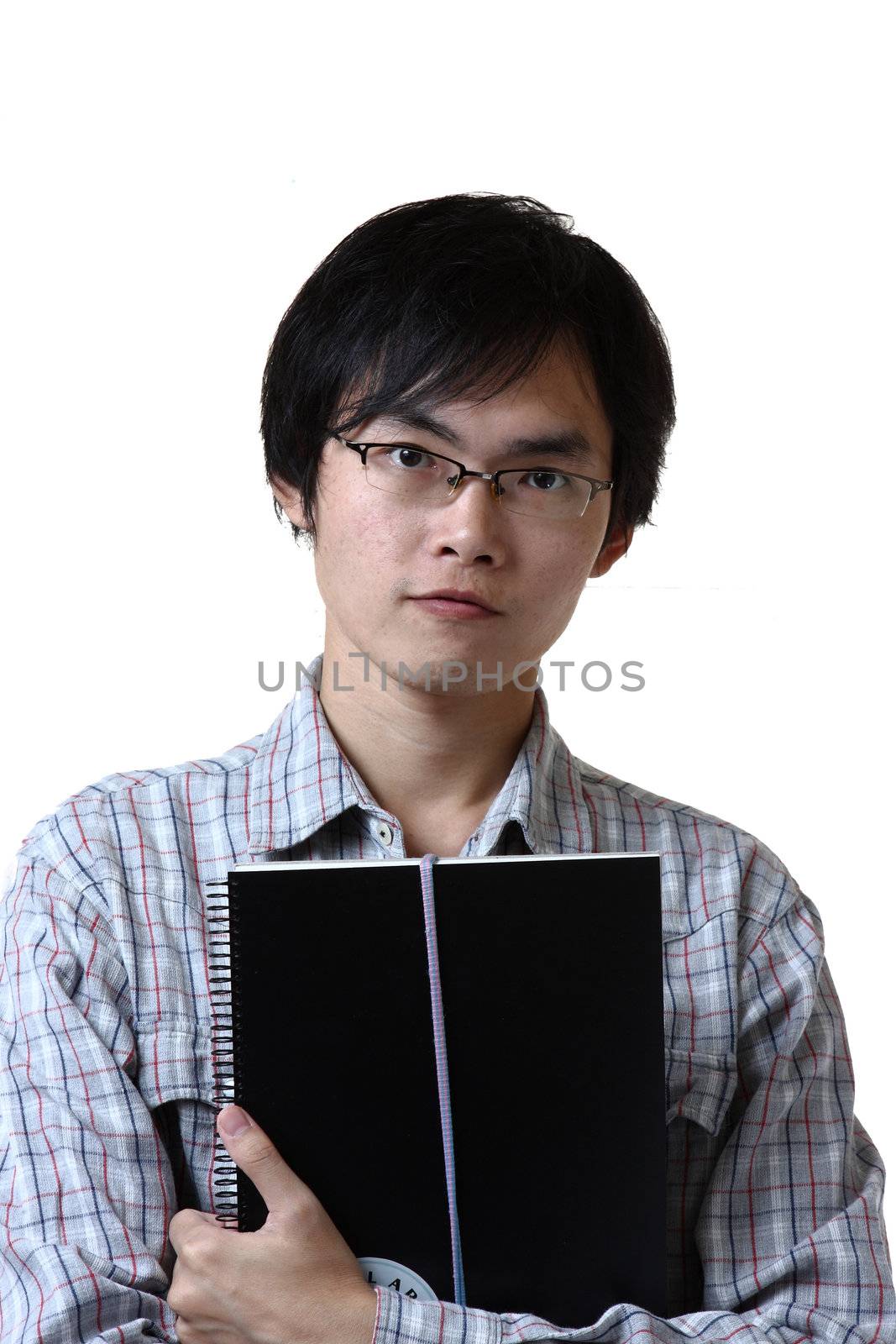 student hand holding book over white background
