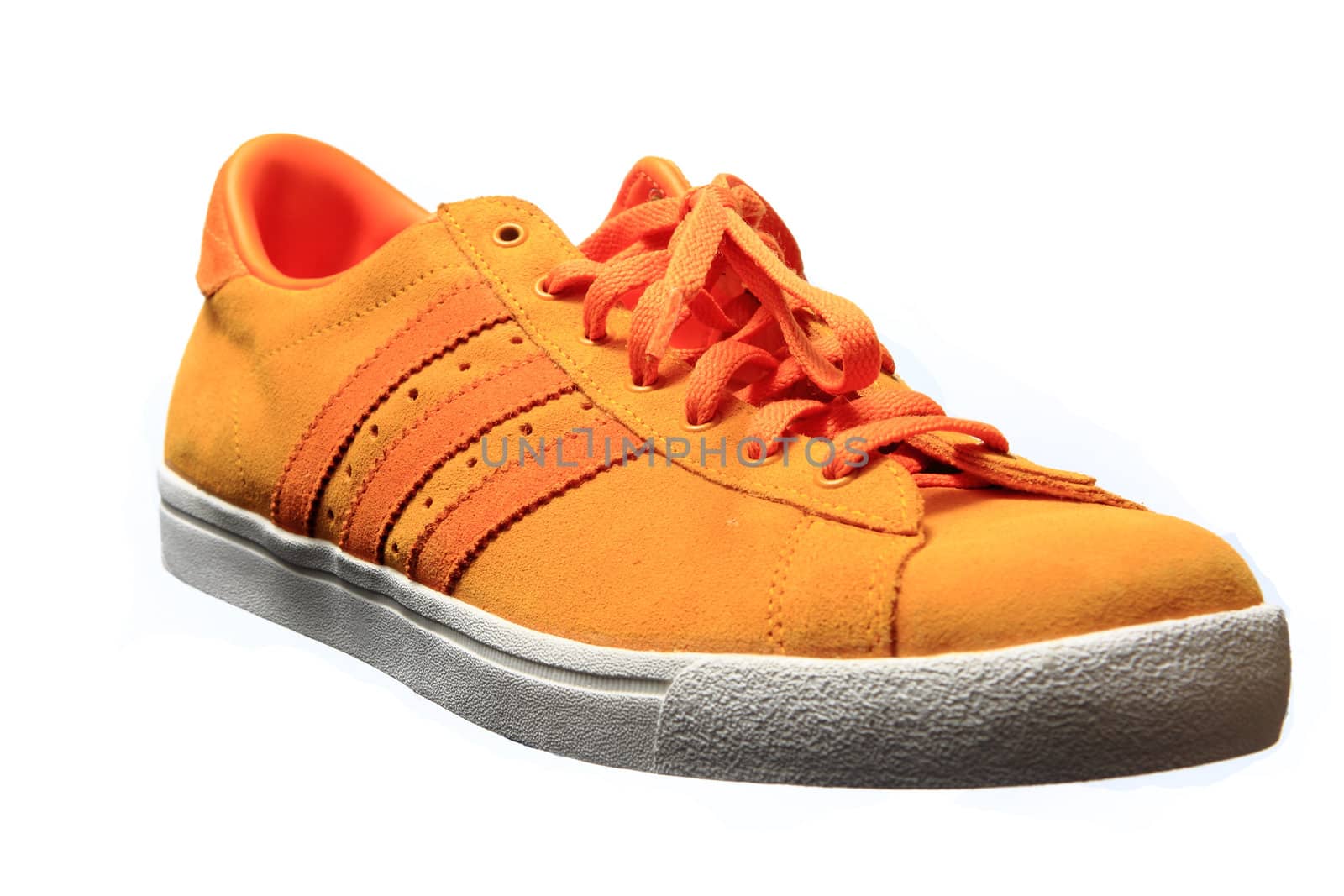 Orange sport shoe close up, isolated on white