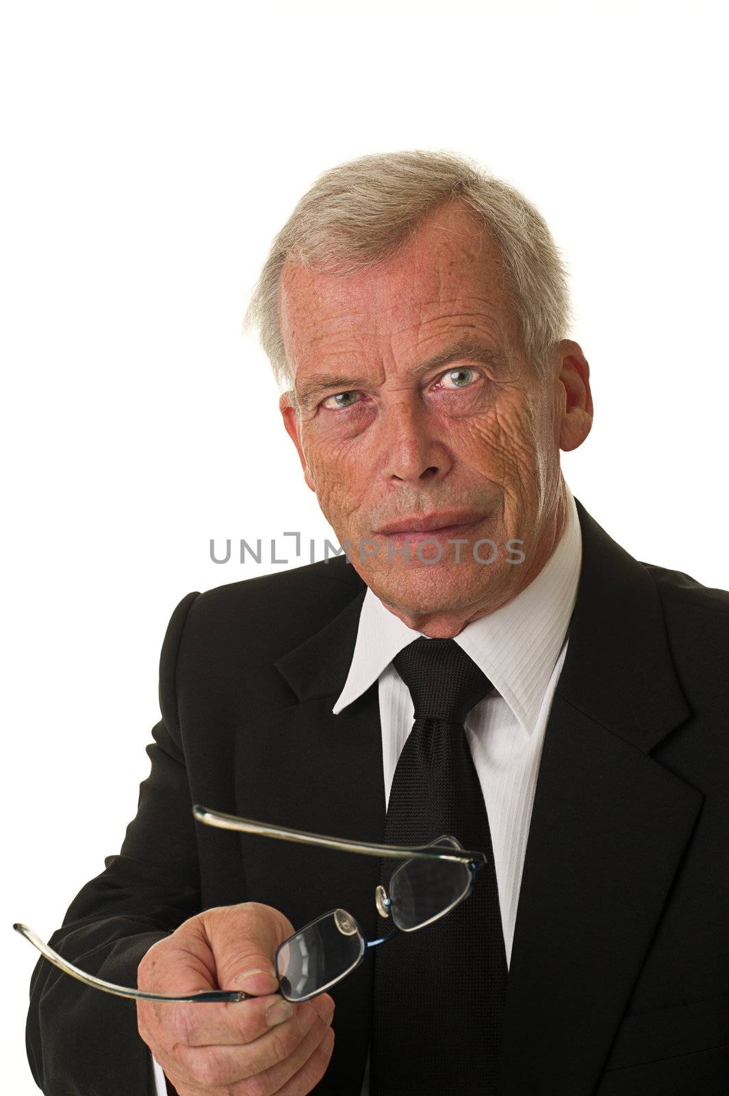 Businessman in black suit over a white background