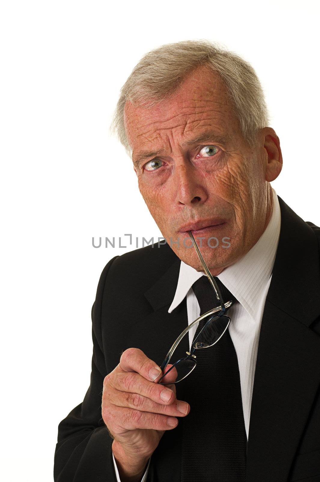 Businessman in black suit over a white background