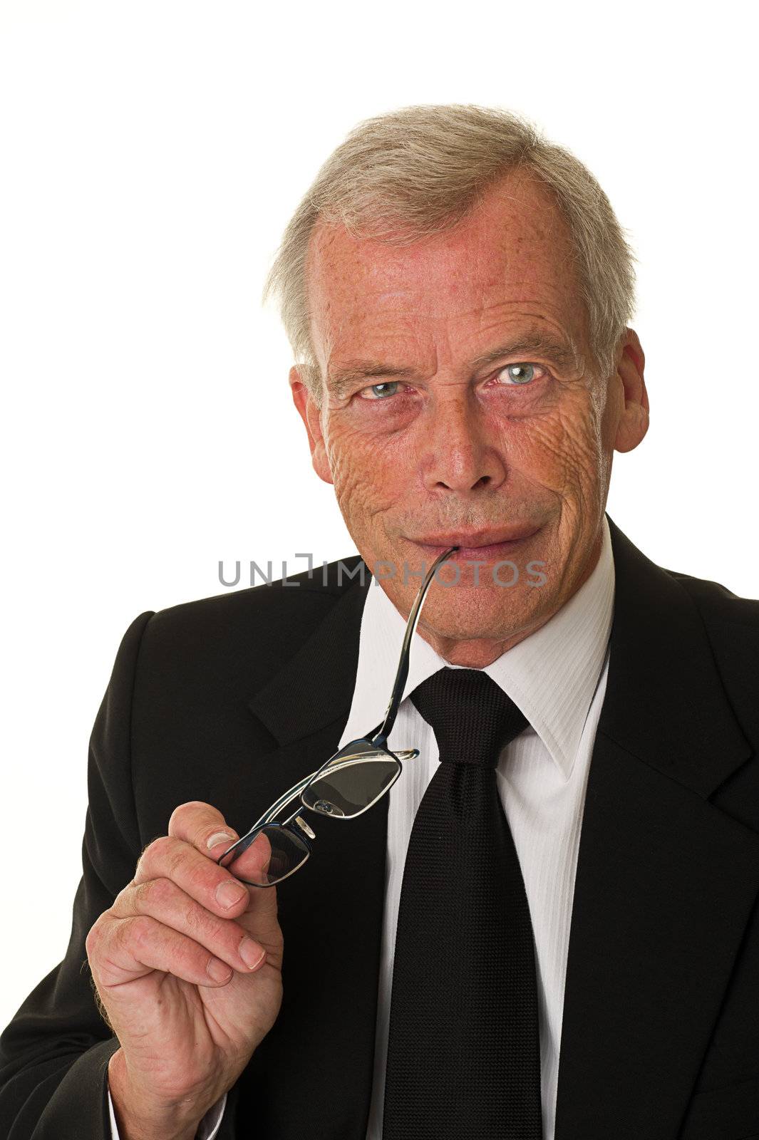 Businessman in black suit over a white background