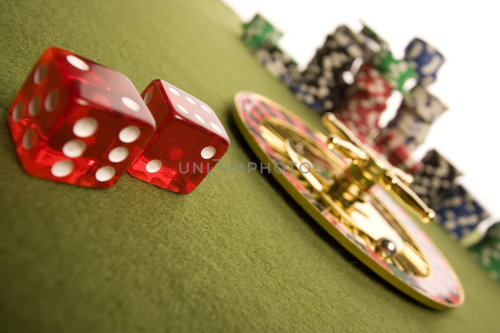 Close-up of a golden roulette and chips