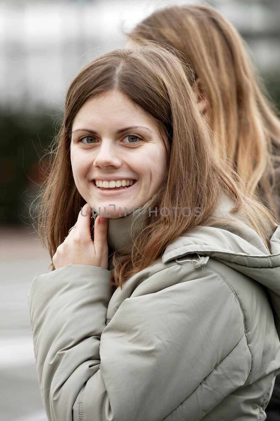 Outdoor female portrait with smiling face