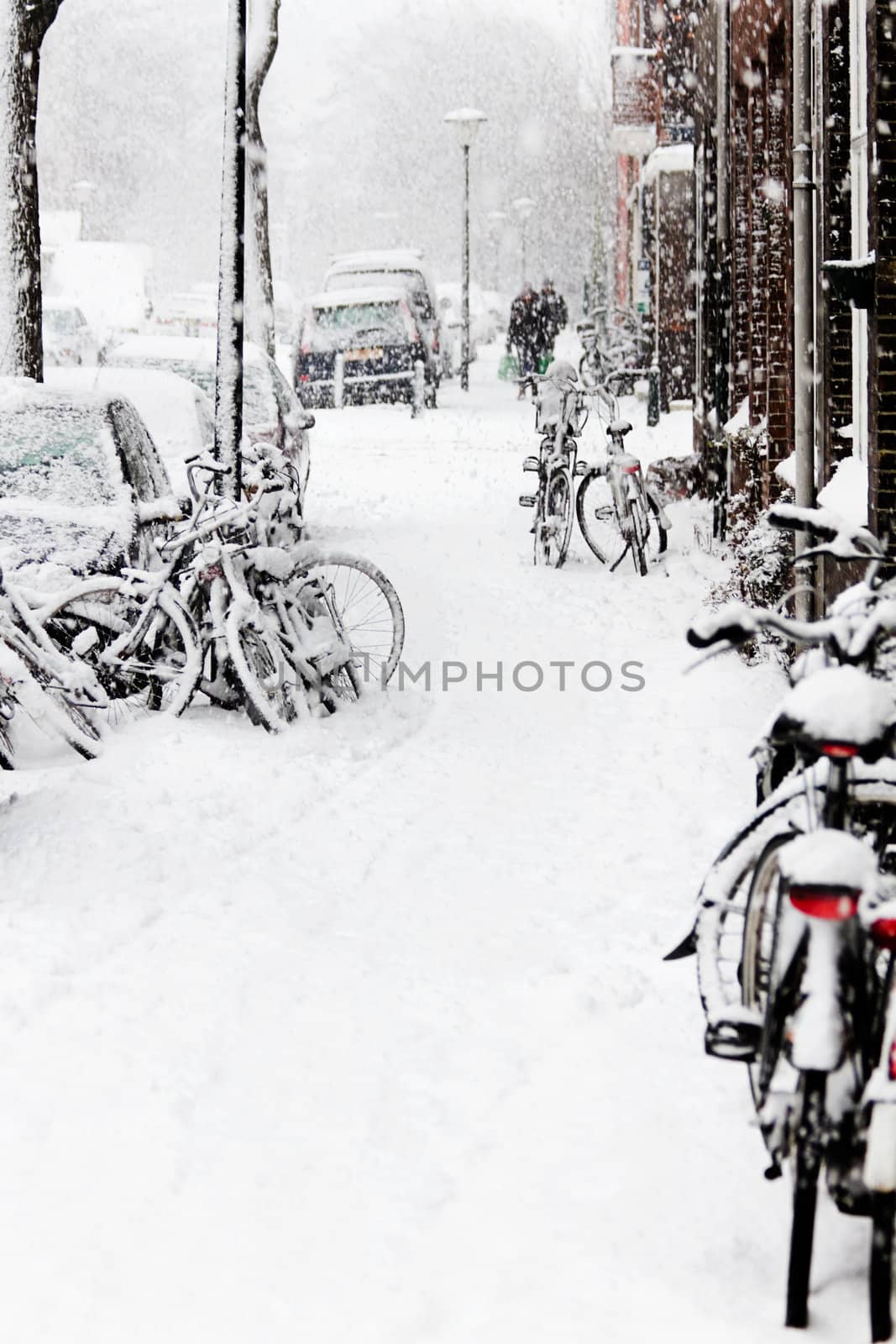 Snow in the city - snowstorm, streetview, bikes by Colette