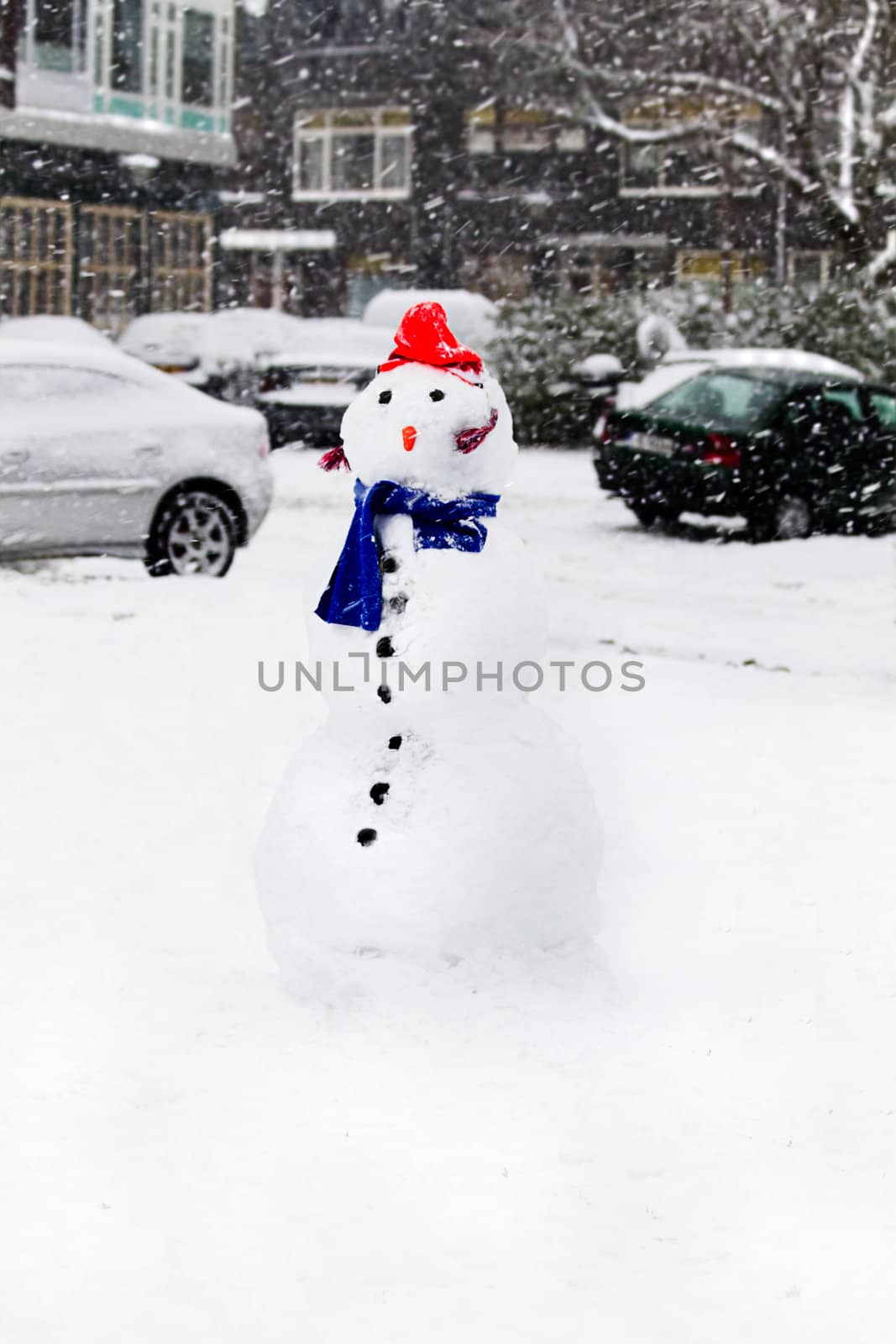 Snow in the city - Snowman in snowstorm