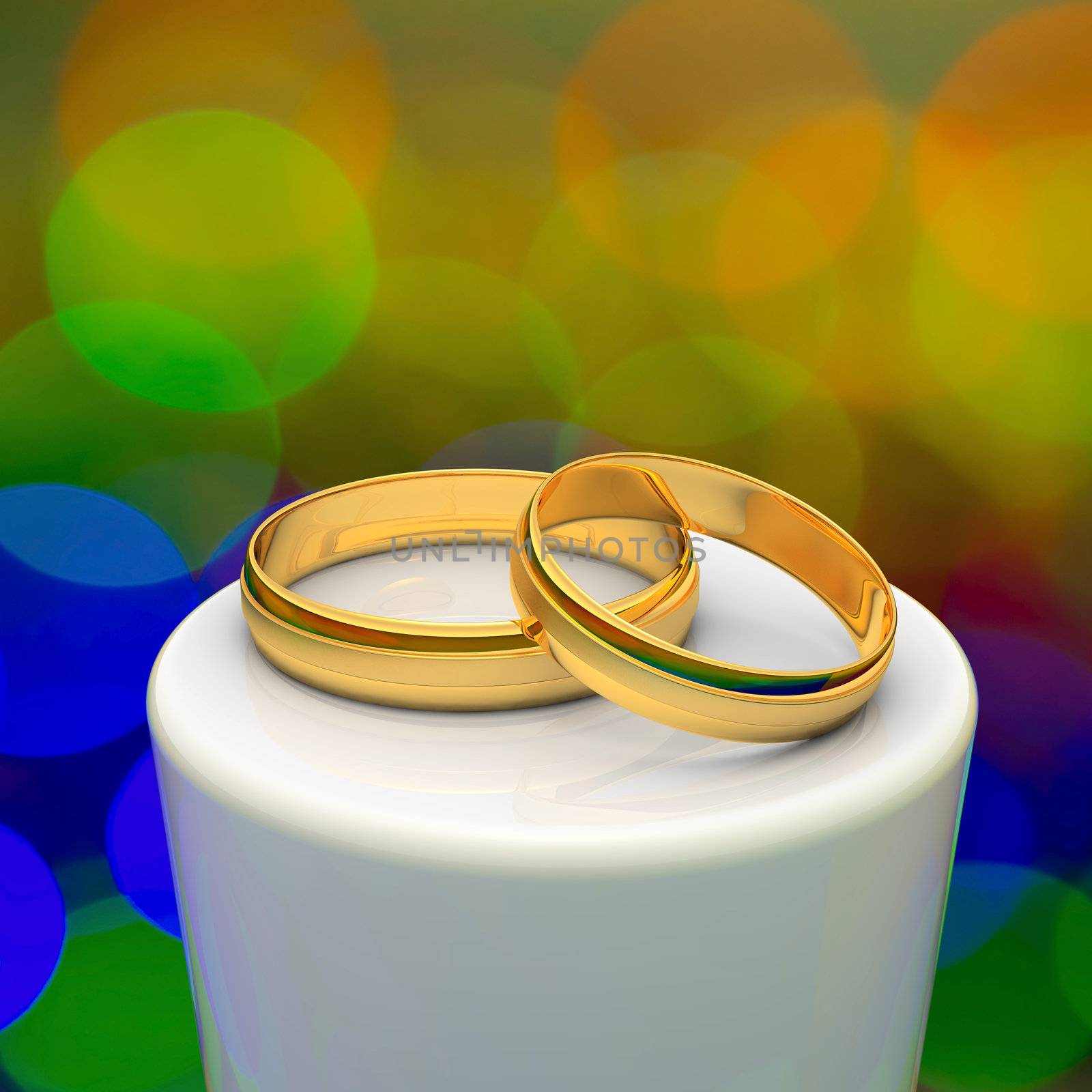 Two gold wedding rings on the podium 