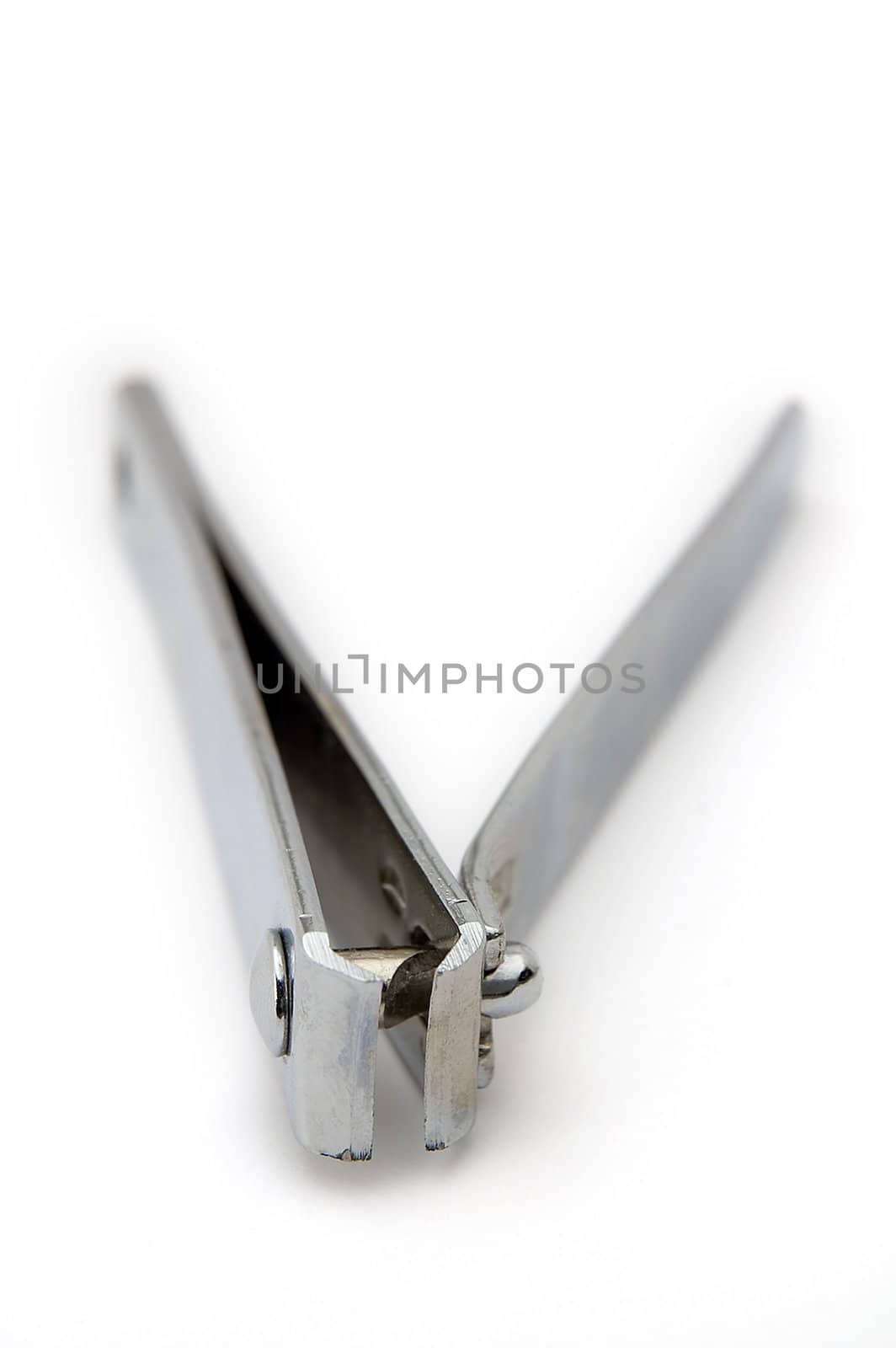 rustless nail cutter isolated on white background, distance blur