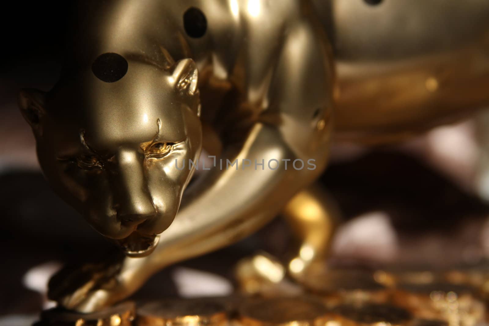 Luxury Golden Jaguar Figurine close up.