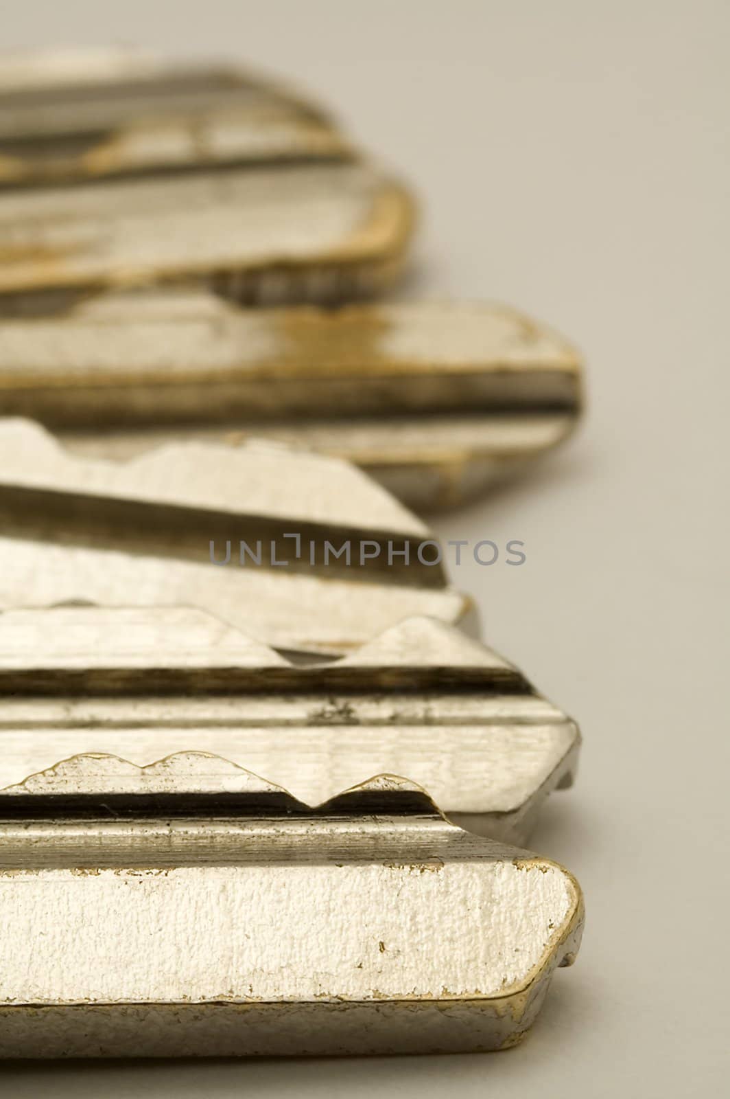several old metal keys detail photo, distance blur