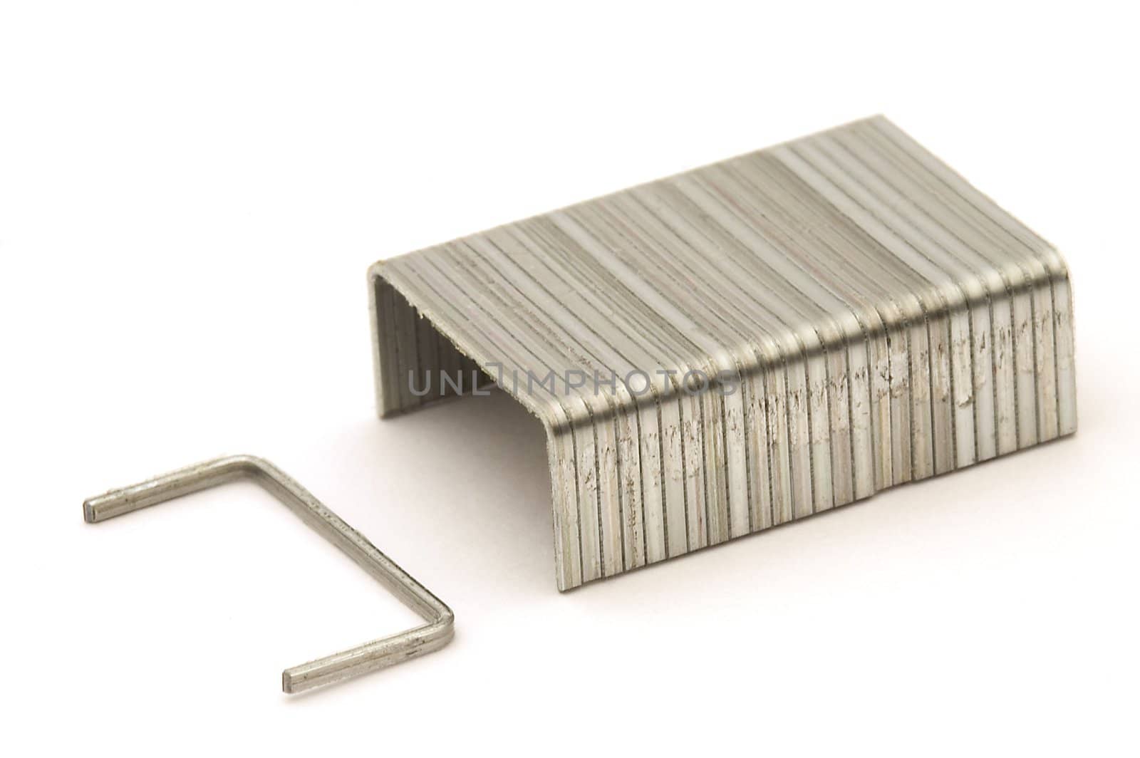 detail photo of small metal clasps, white background
