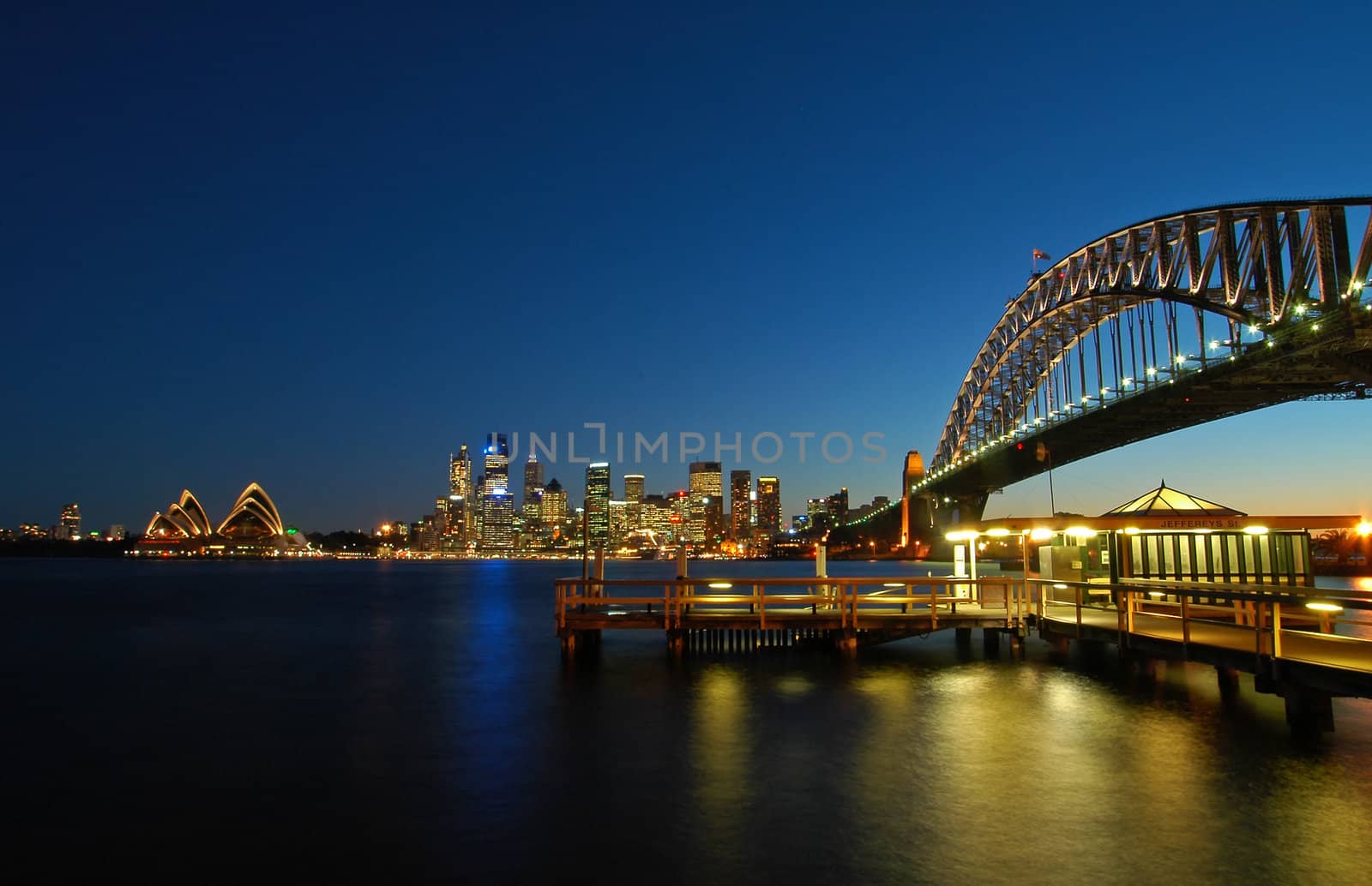 Sydney CBD with Sydney Tower, Opera House and Harbour bridge, dusk