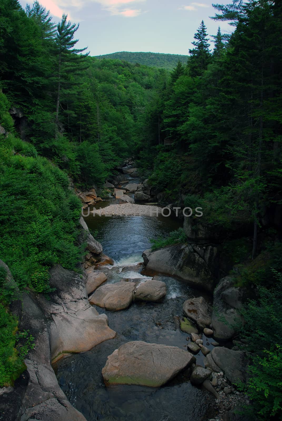 Picture of a natural small water fall in summer