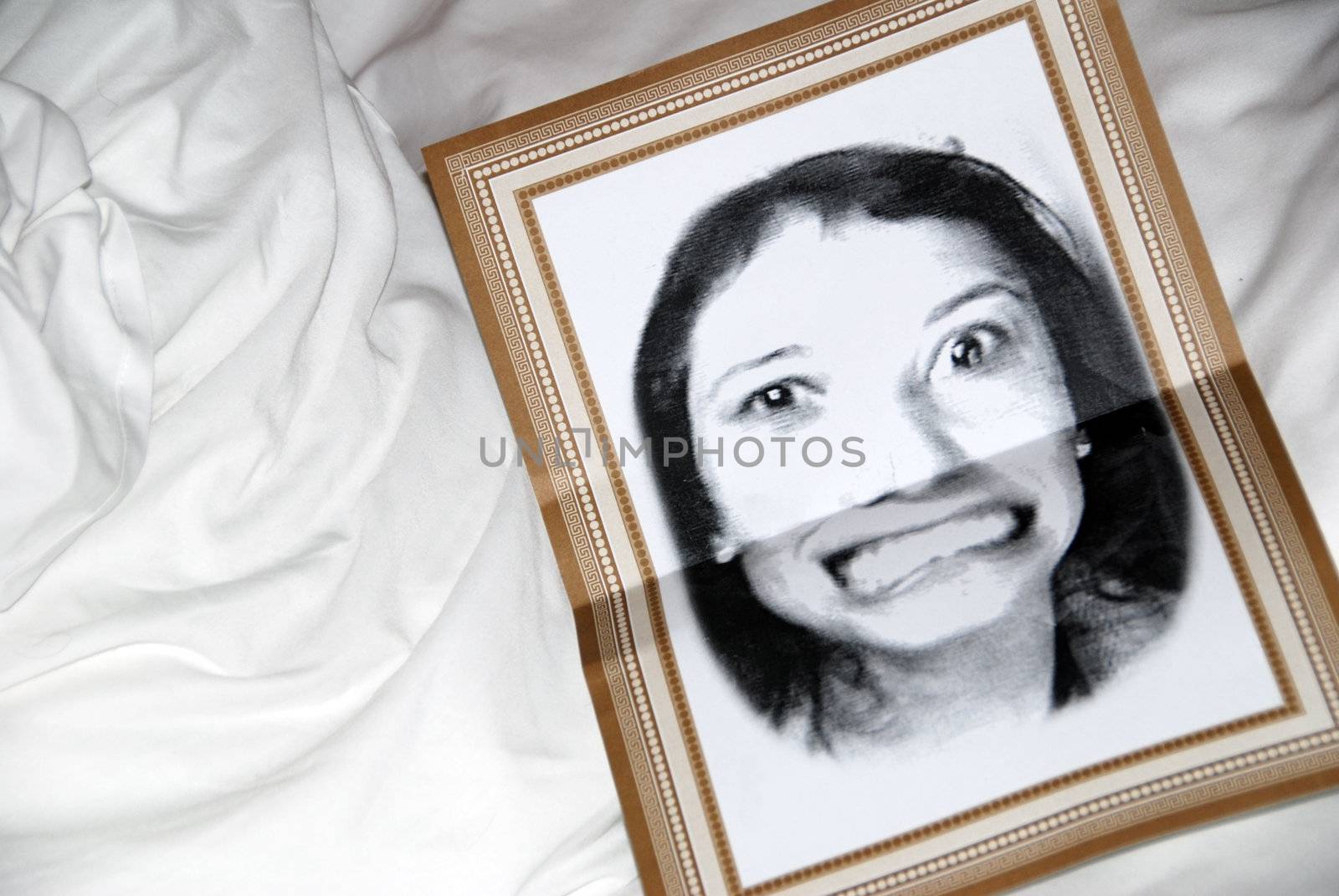 Shot of strange picture of Woman on Pillow.