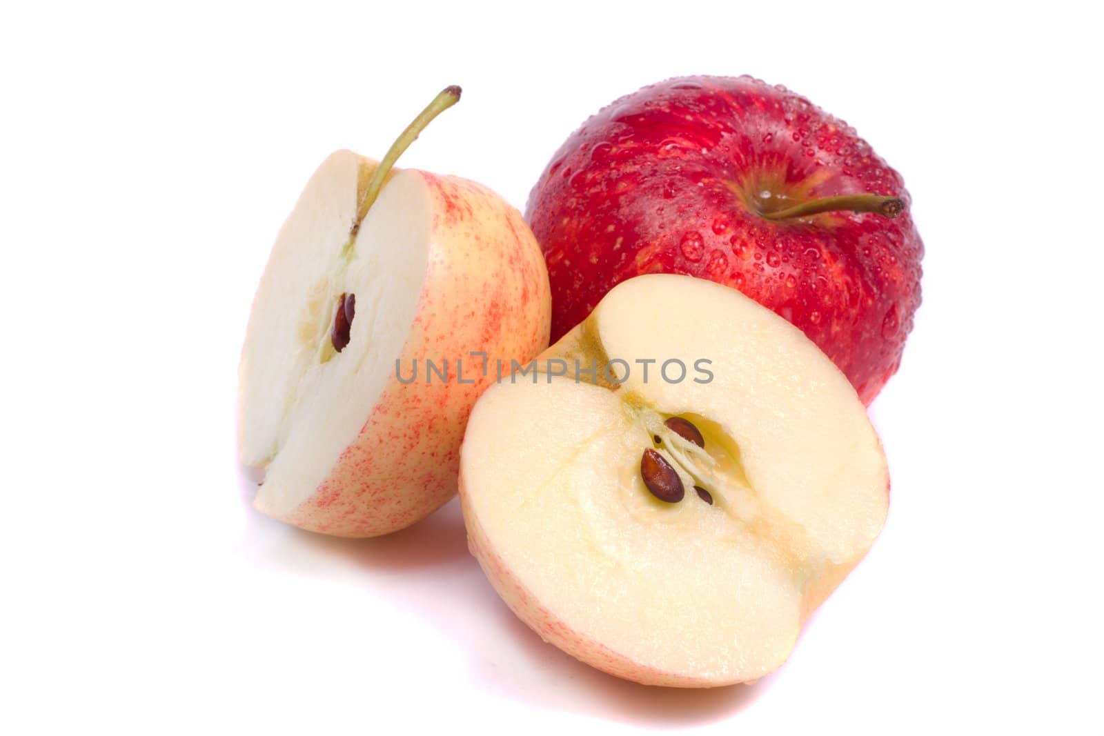Close up view of some fresh royal gala apples isolated on a white background.
