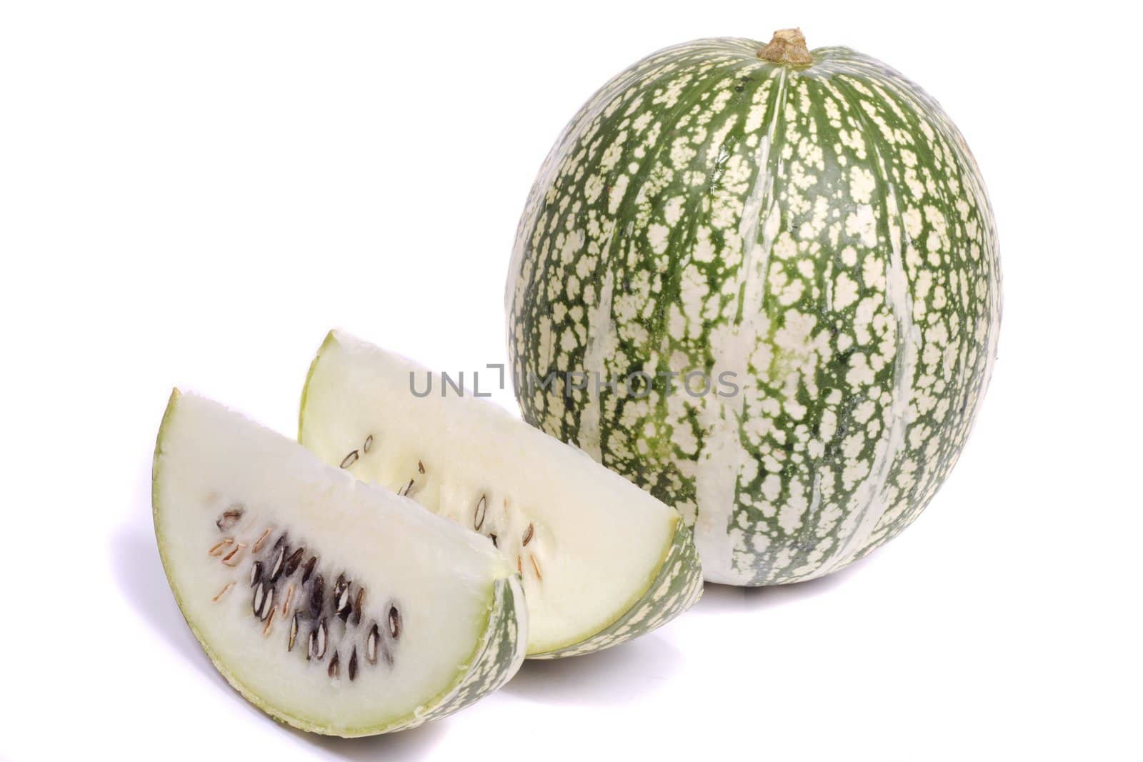 Close up view of a green striped green pumpkin isolated on a white background.