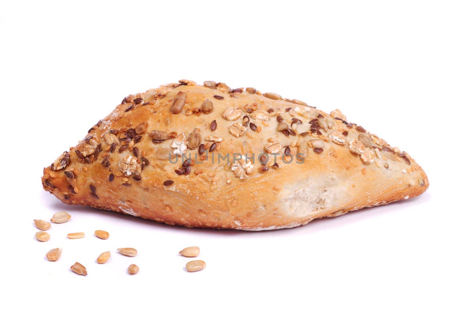 Close view of some fresh cereal bread isolated on a white background.
