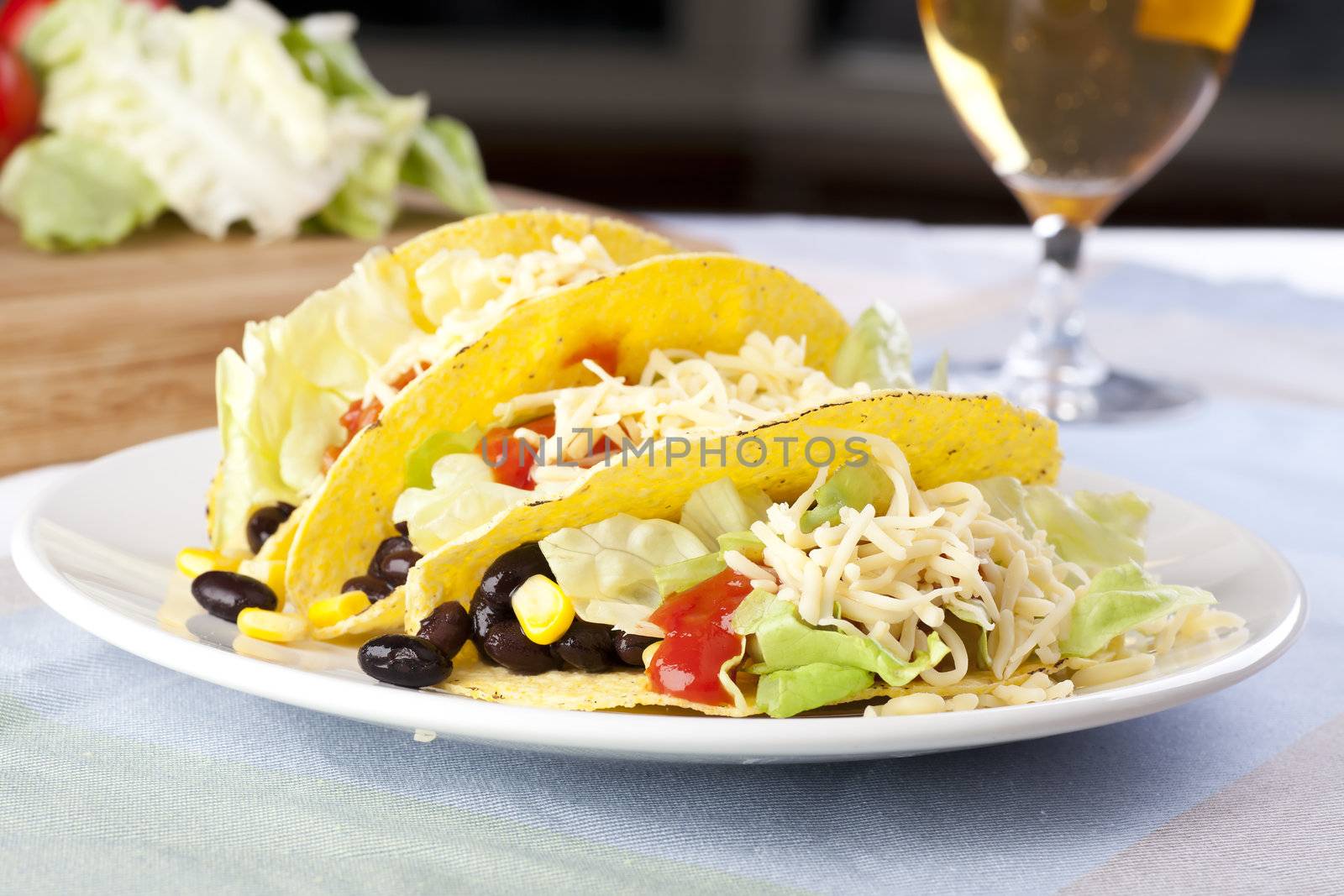 Homemade vegetarian tacos with black beans and sweet corn.