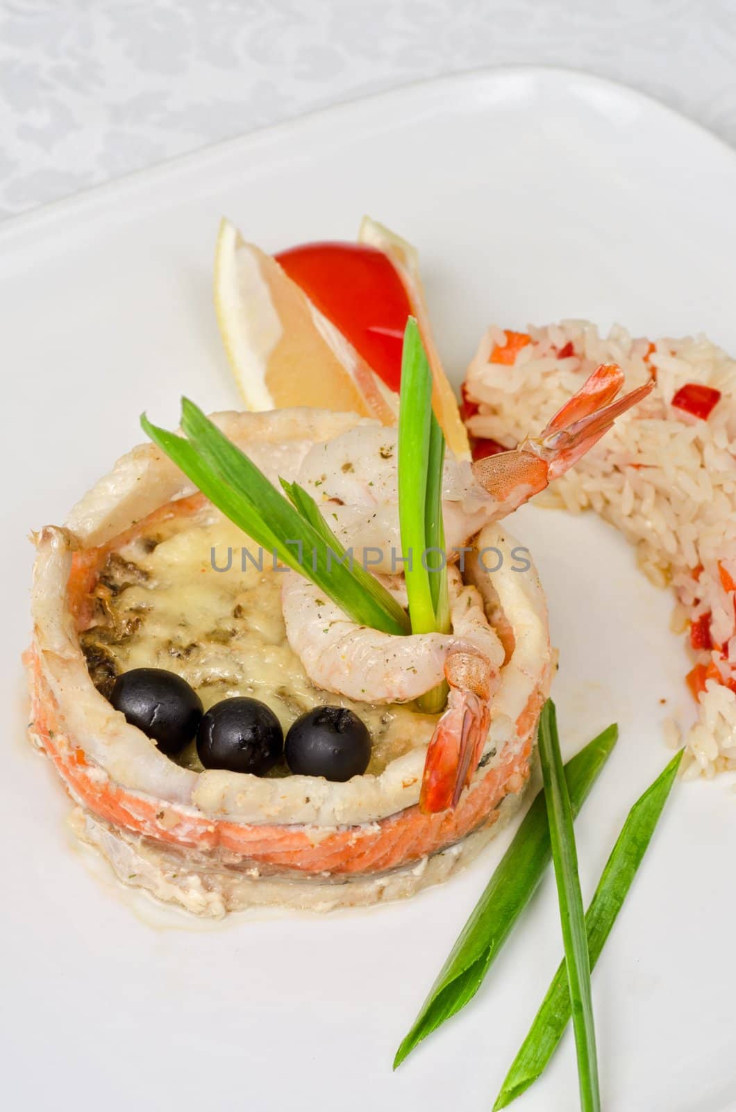tasty prepared fish with rice and vegetables